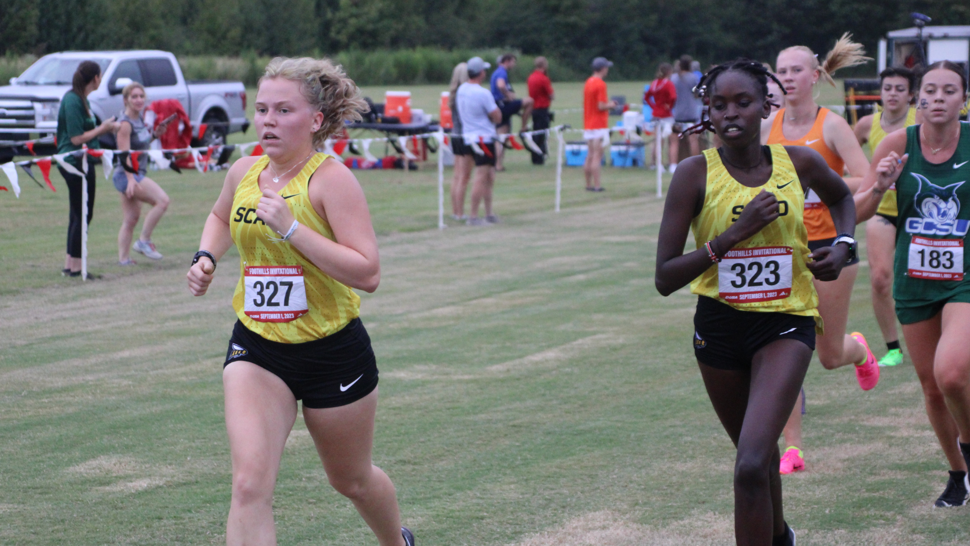 Ashlyn Vanlandingham and Belinda Chepkosgei racing at the Foothills Invite