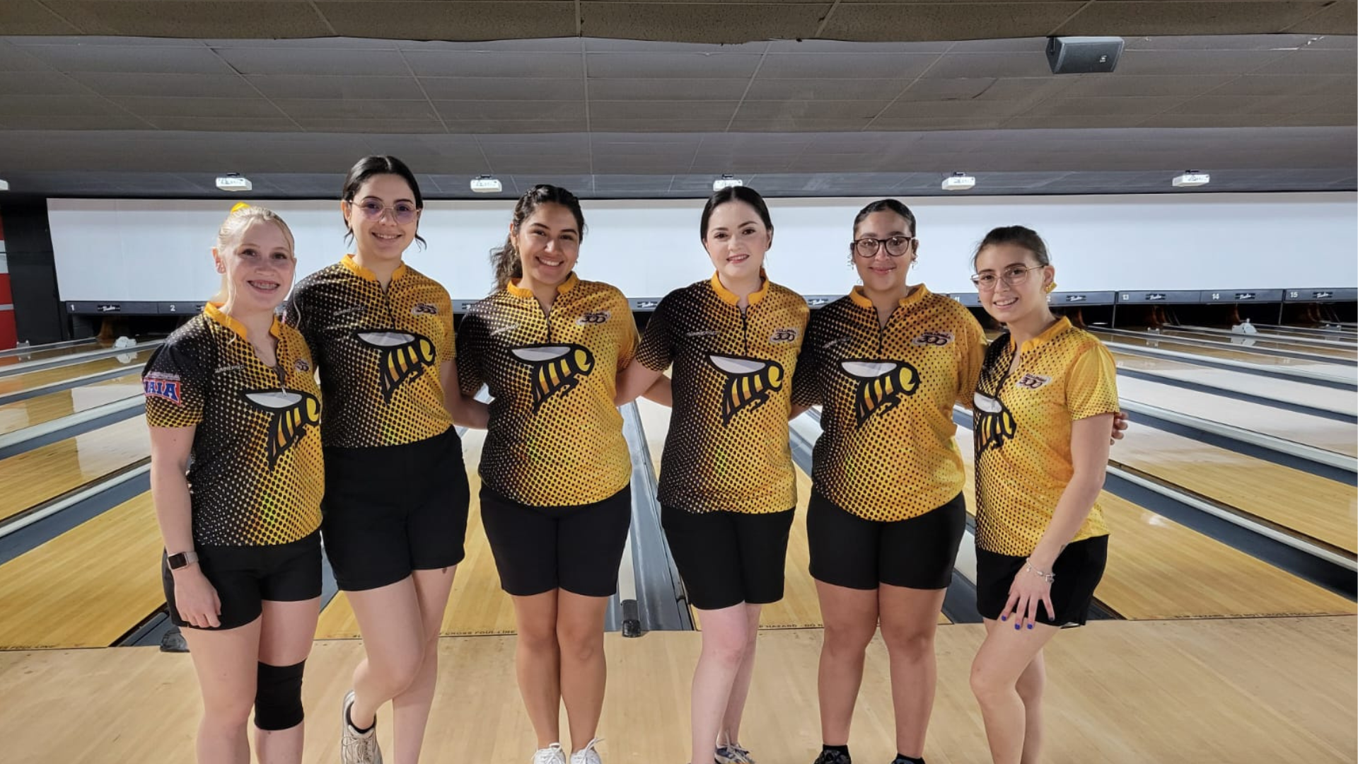 The women's bowling team poses on the lanes after the Midstates Tournament.