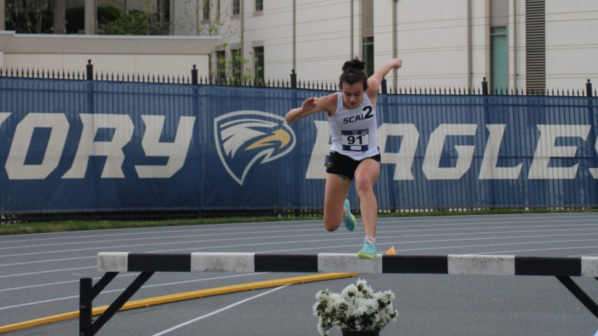 Gray Pershing Racing the steeplechase at the Emory Dooley Elite Meet.
