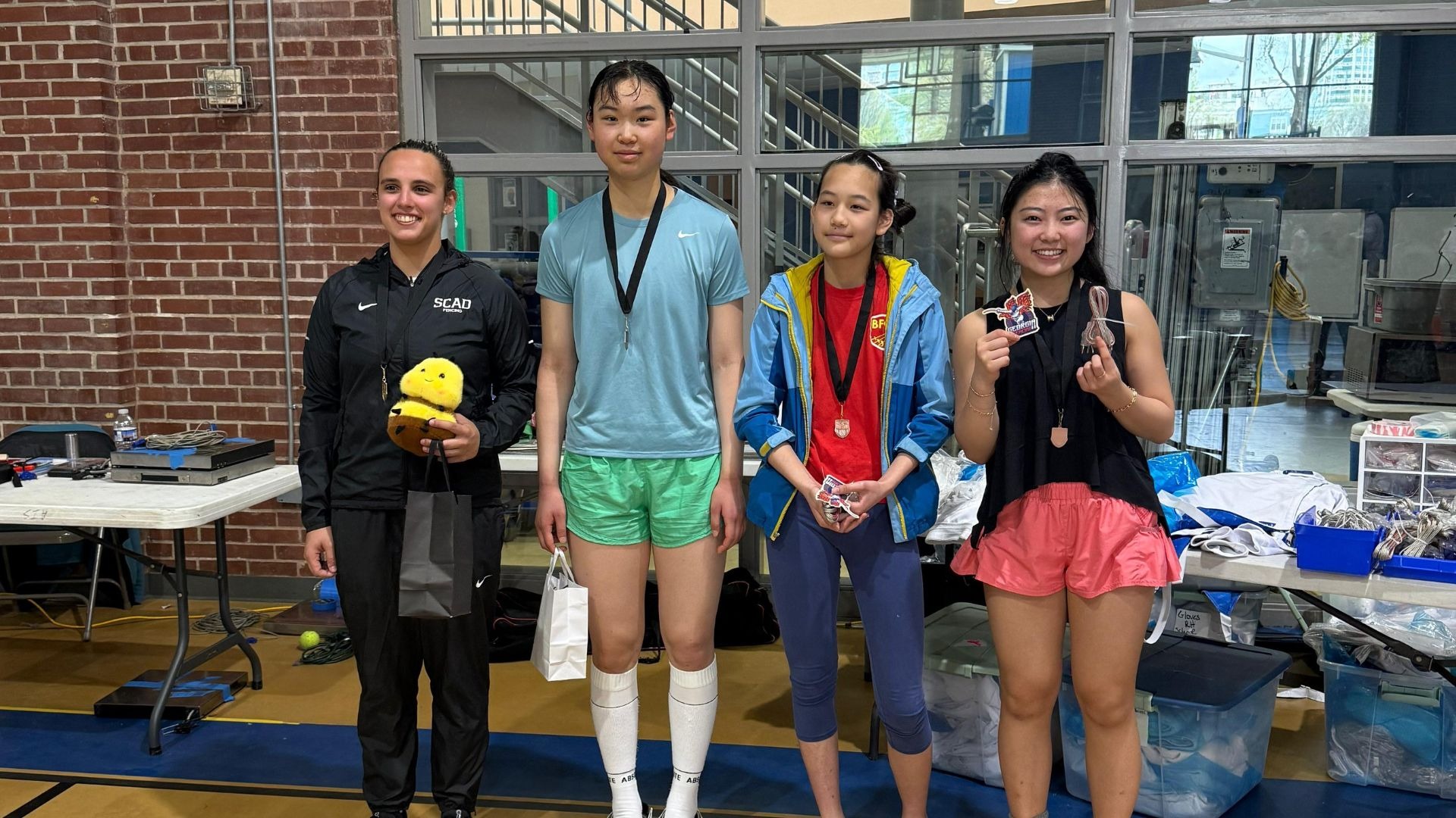 Gabi Vianna poses on the podium for the Lima Grand Prix