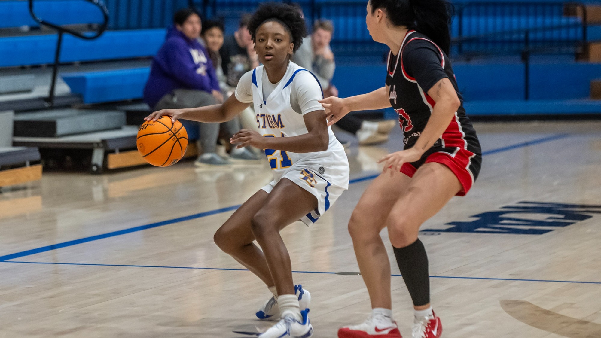 Chloe Eversole drives the ball up the floor versus Northwestern Oklahoma State