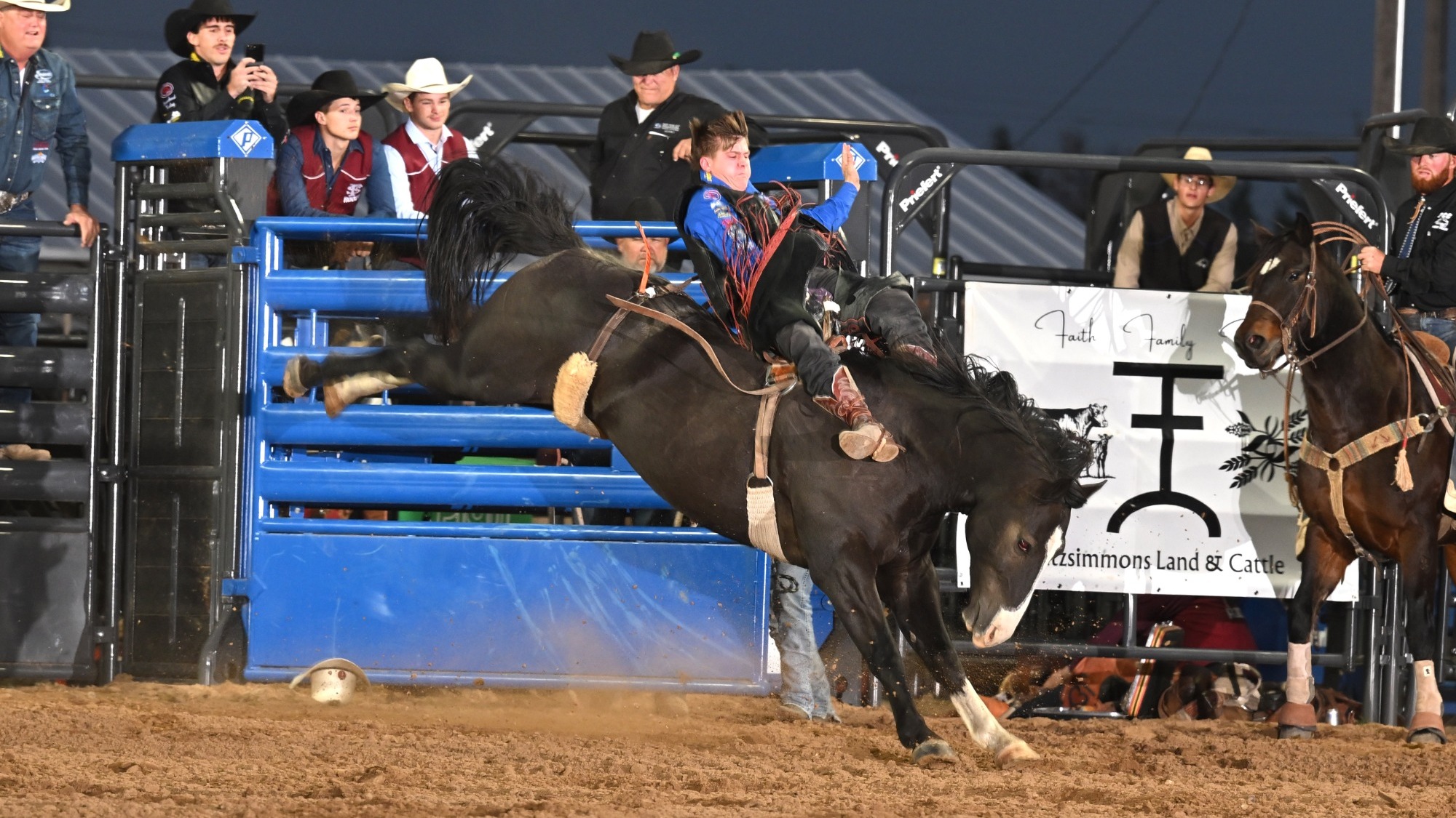Kash Martin rides bareback at Pratt CC Rodeo