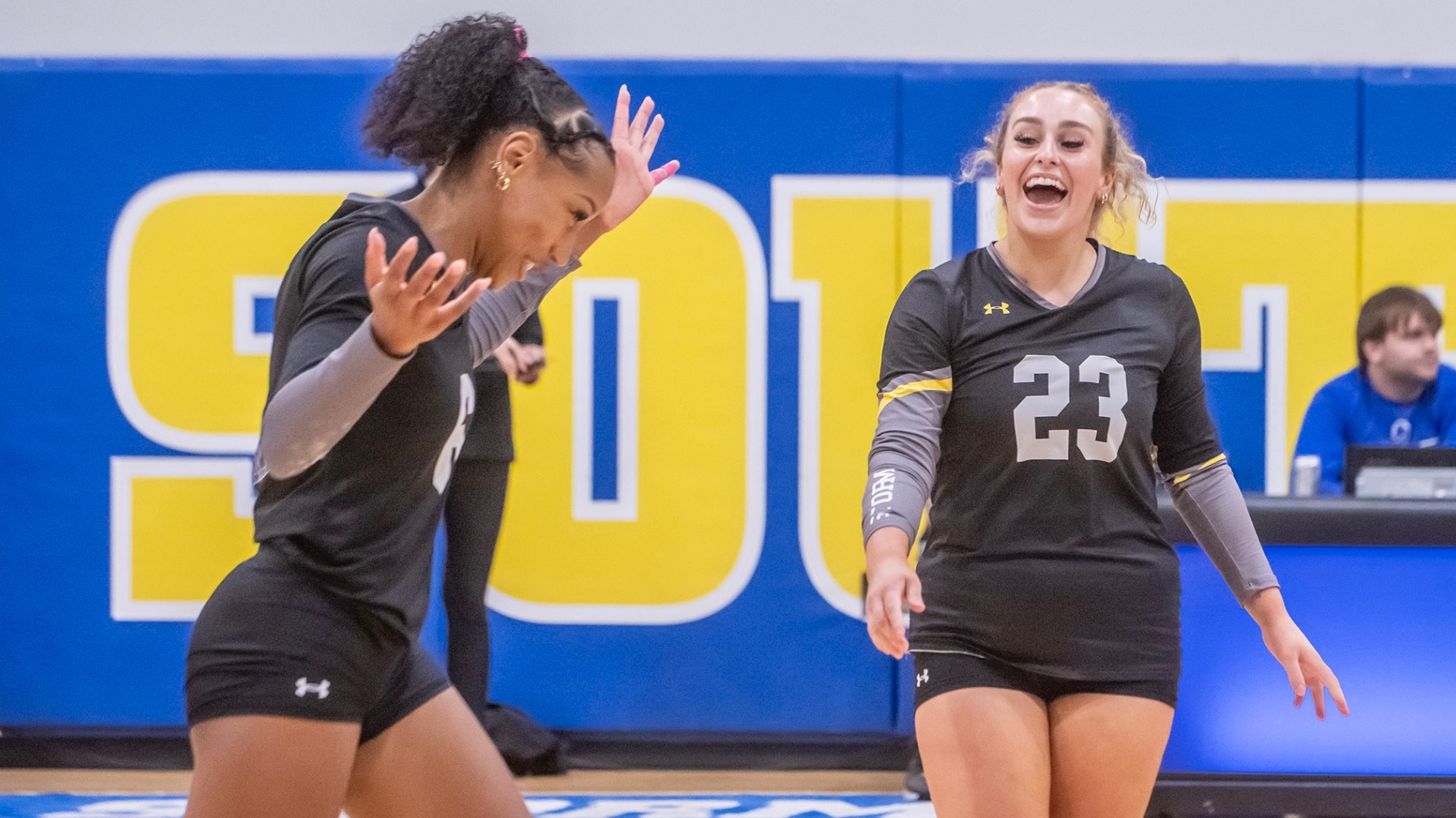 Kylee Turner and Gabby Jones celebrating a point vs UAM