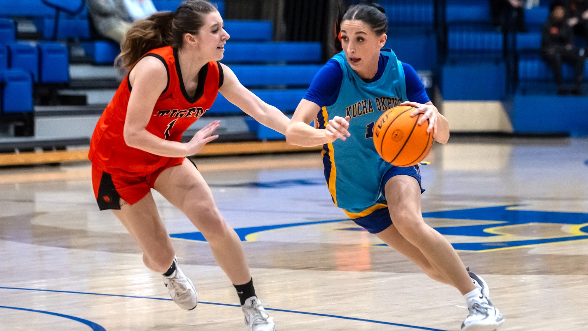 Kenzli Warden drive past and East Central player