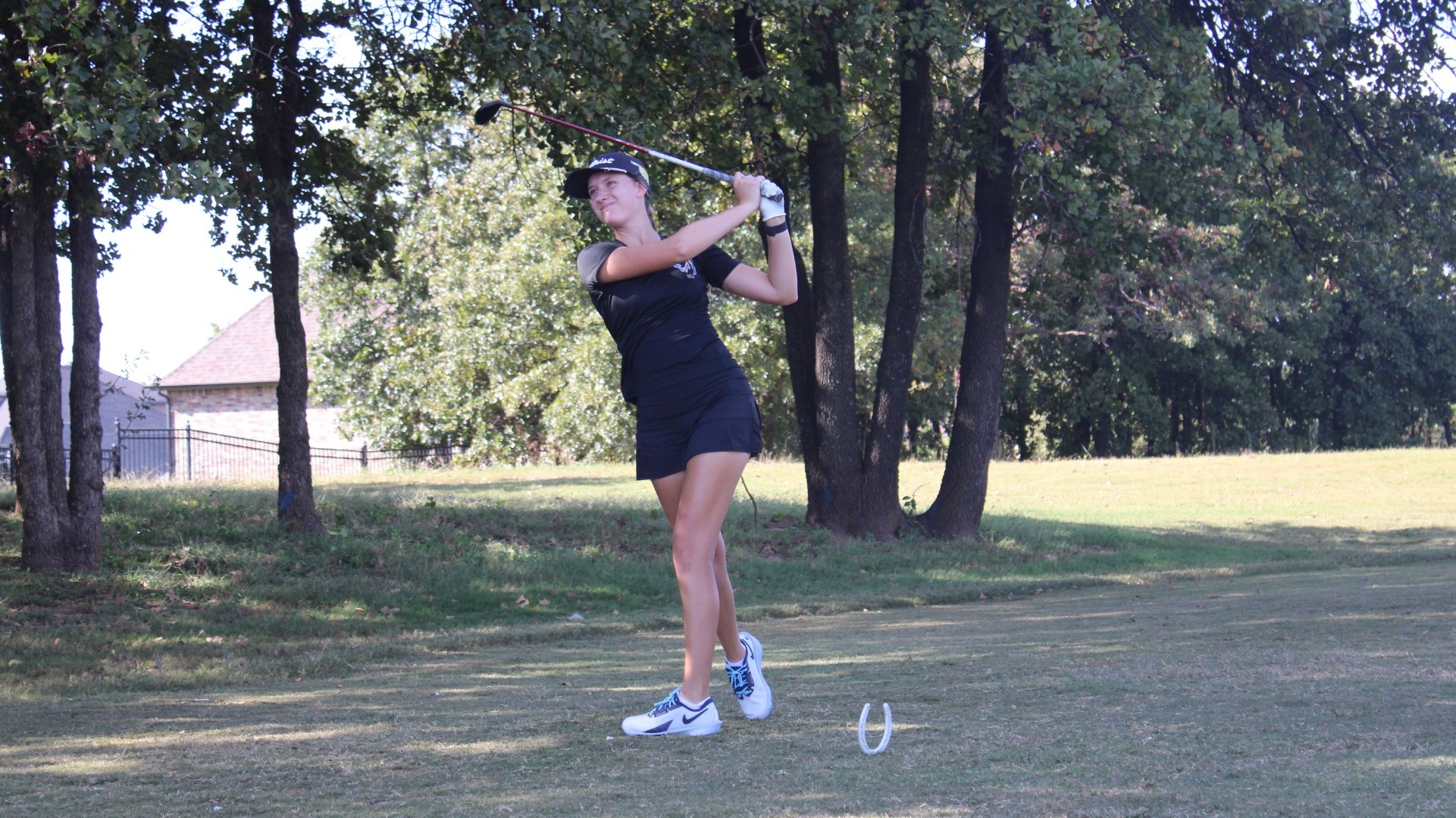 Kaeli Drake teeing off