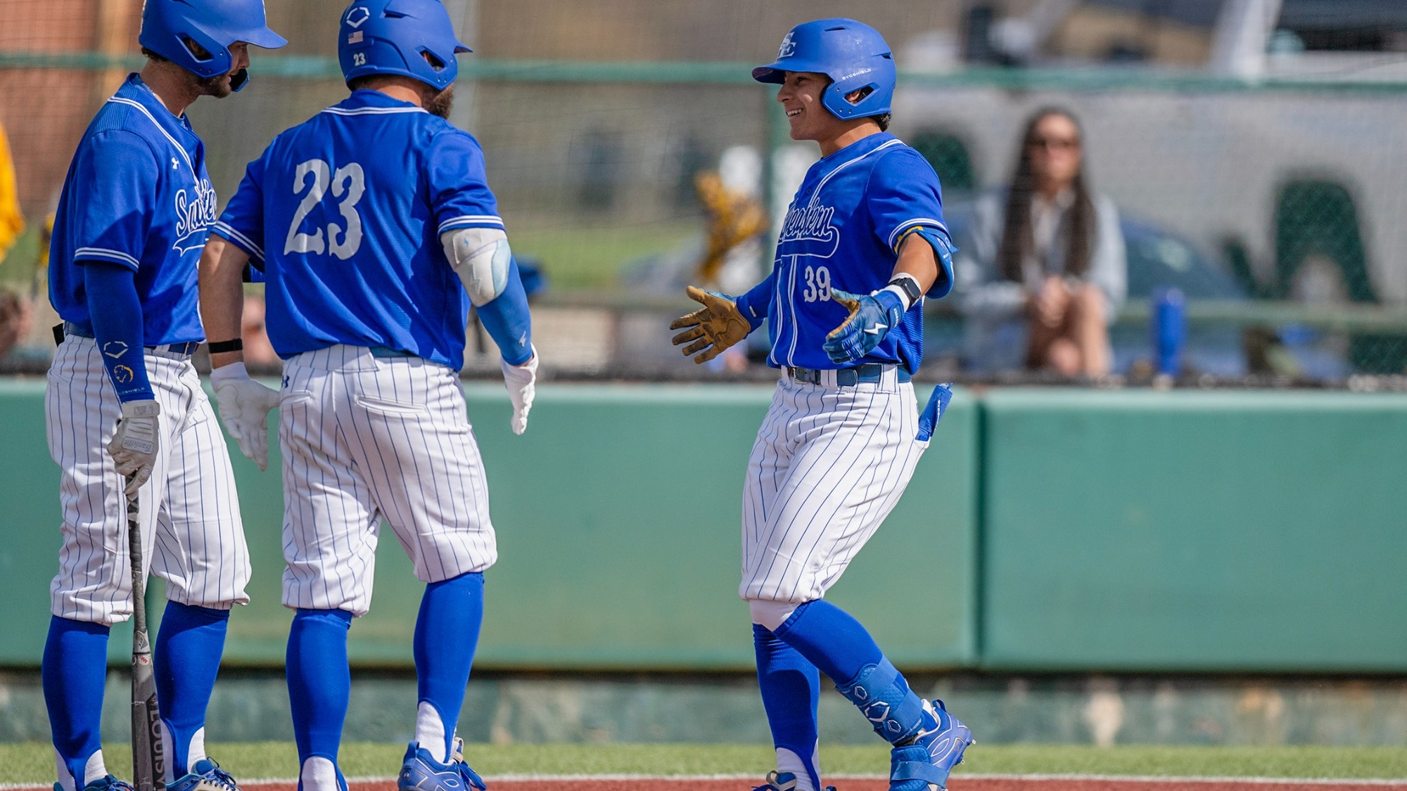 Isaac Villa crosses home plate following a home run