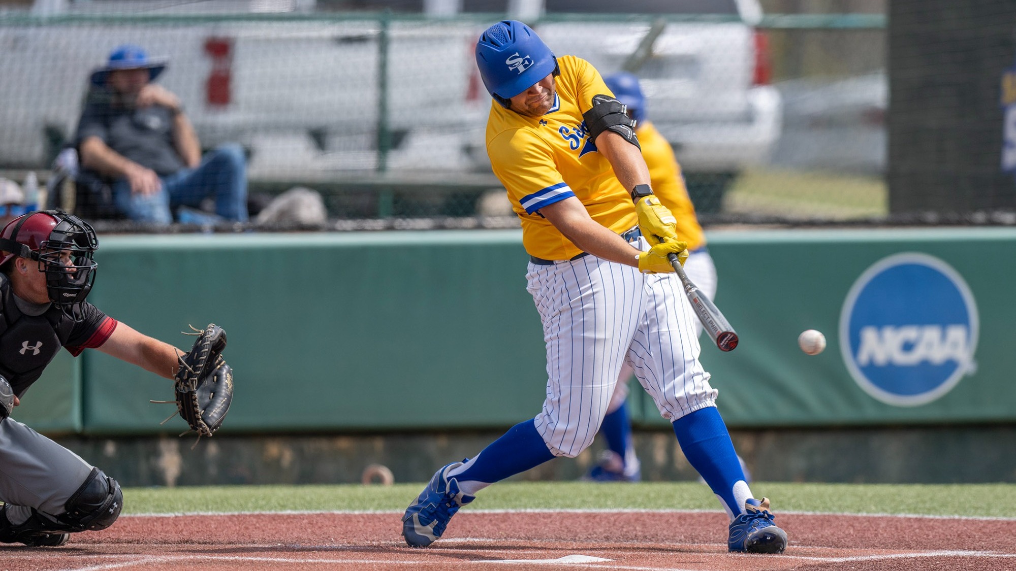 Carter Olson swings during an at bat versus Southern Nazarene