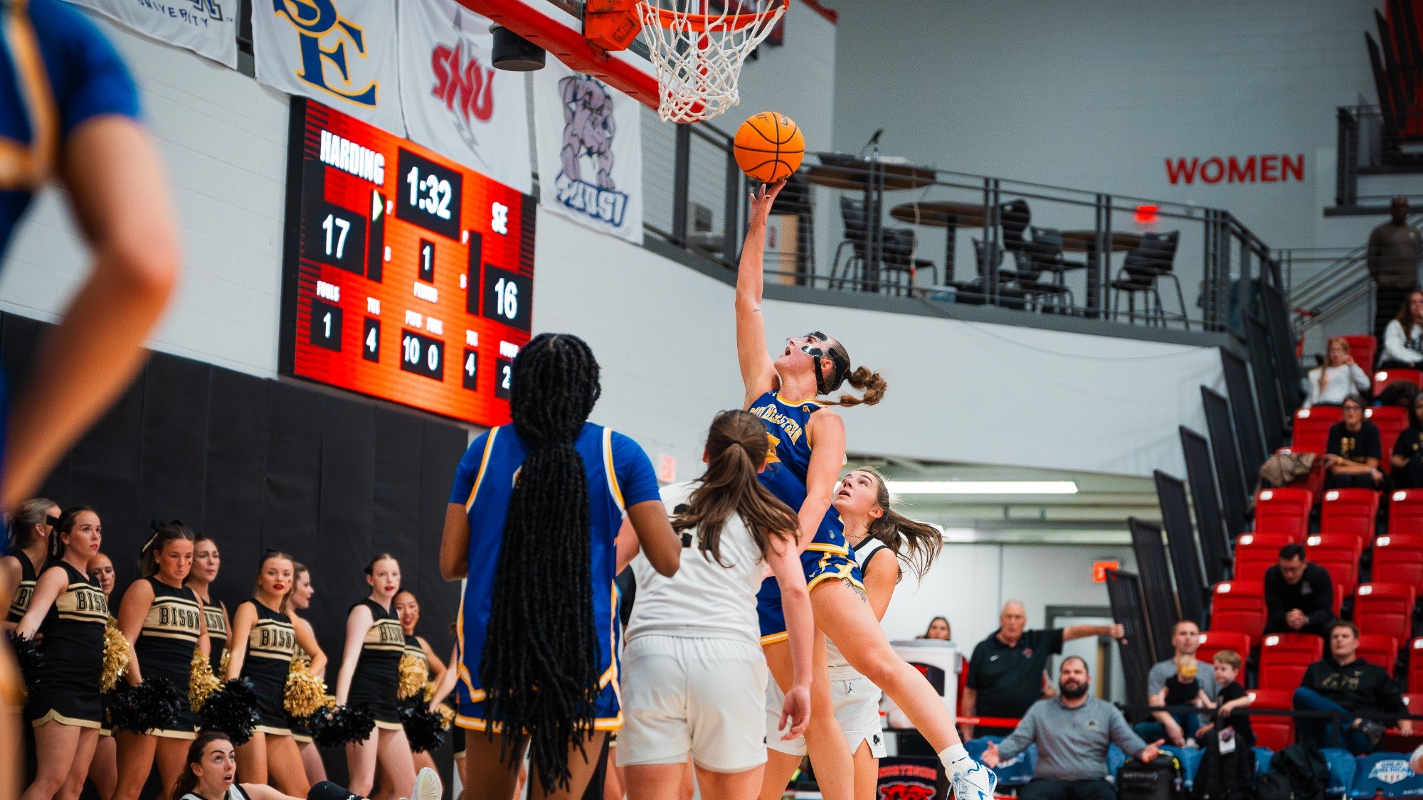 Tori Kilburn hits a layup versus Harding