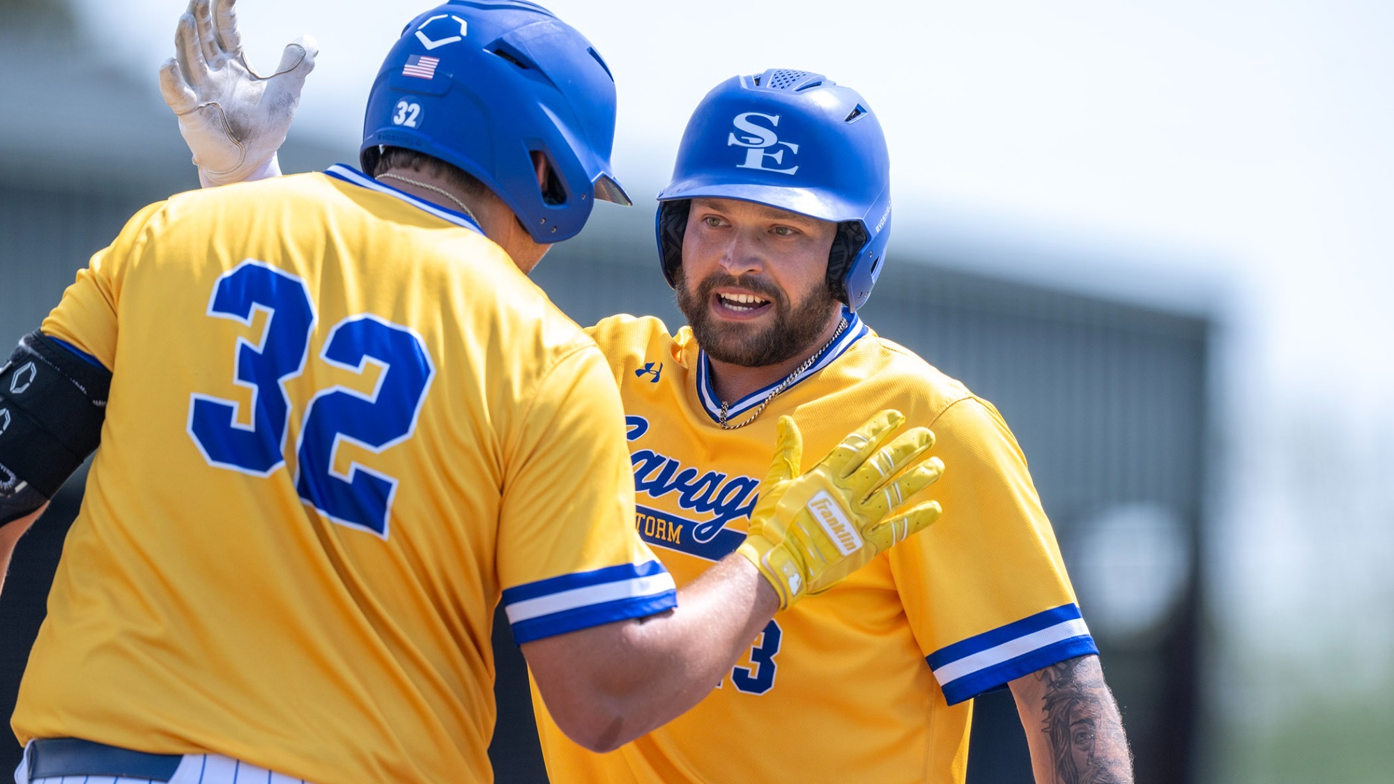 JJ Bush and Carter Olson celebrate