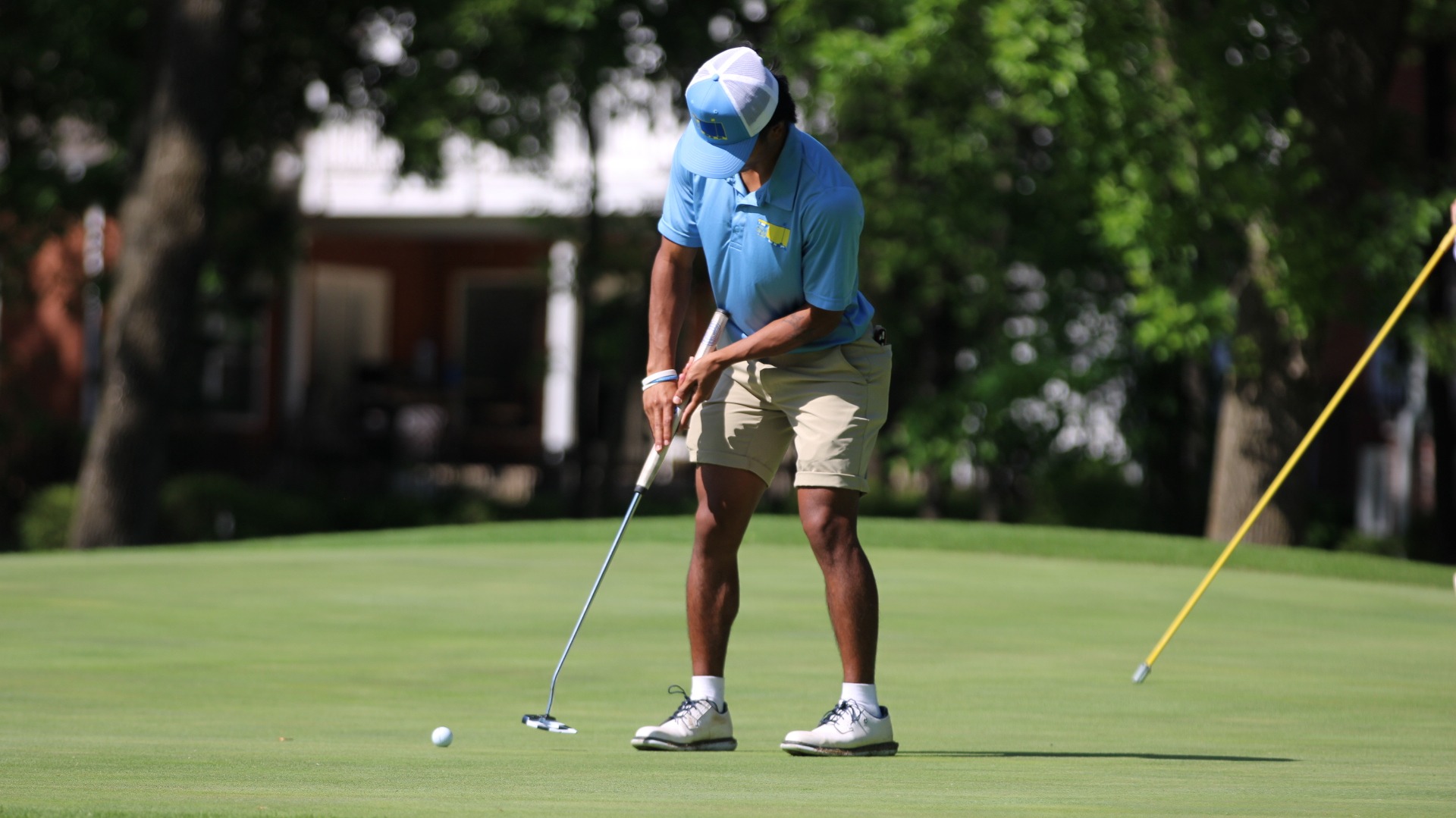 Jesse Tandoy putting at the GAC Tournament 