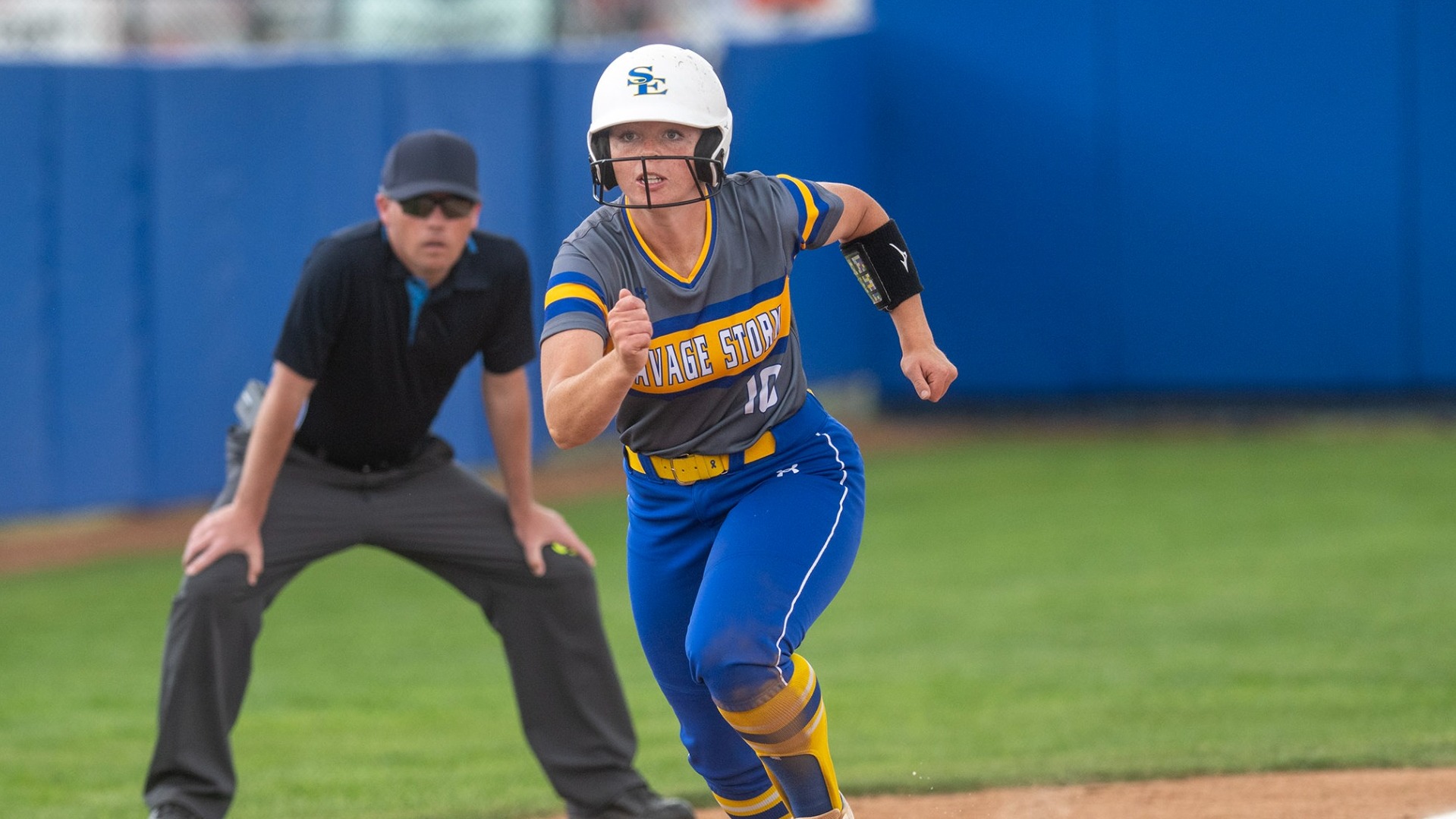 Tally Rowland running home from third