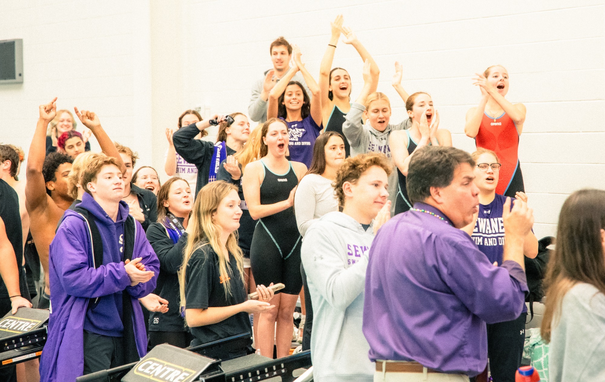 swim and dive, cheering at conference meet