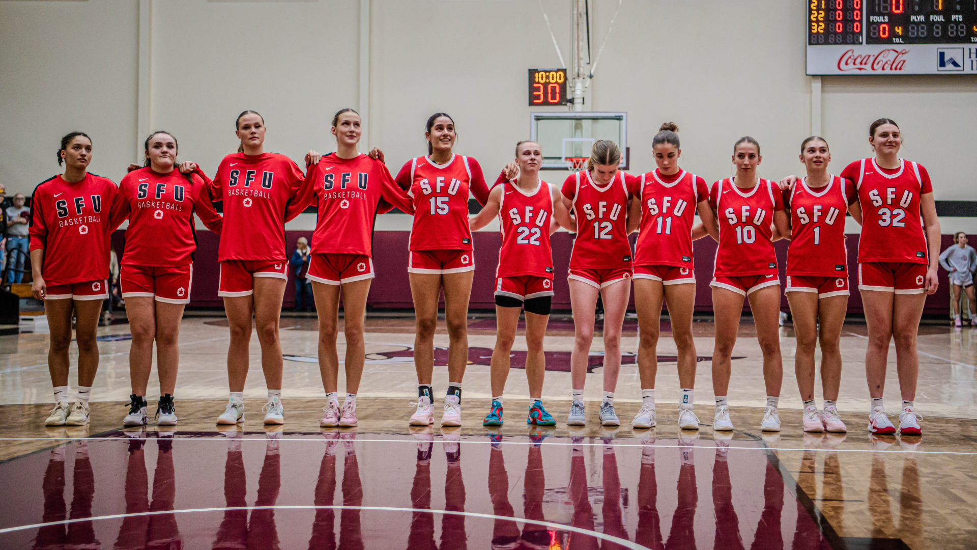 SFU Women's Basketball Stands together at the CMU Maverick Thanksgiving Classic
