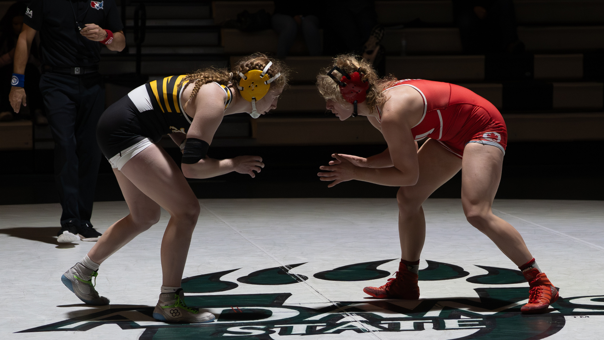 A women's wrestling match featuring SFU.