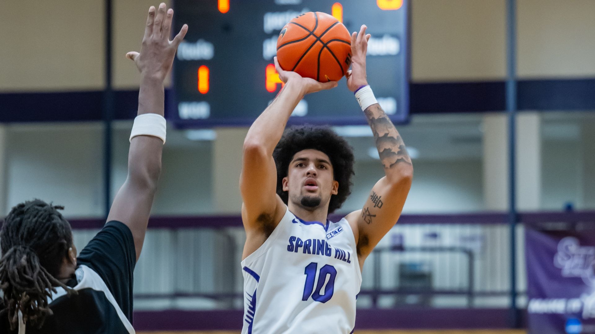 Brian Harris shoots over the defense