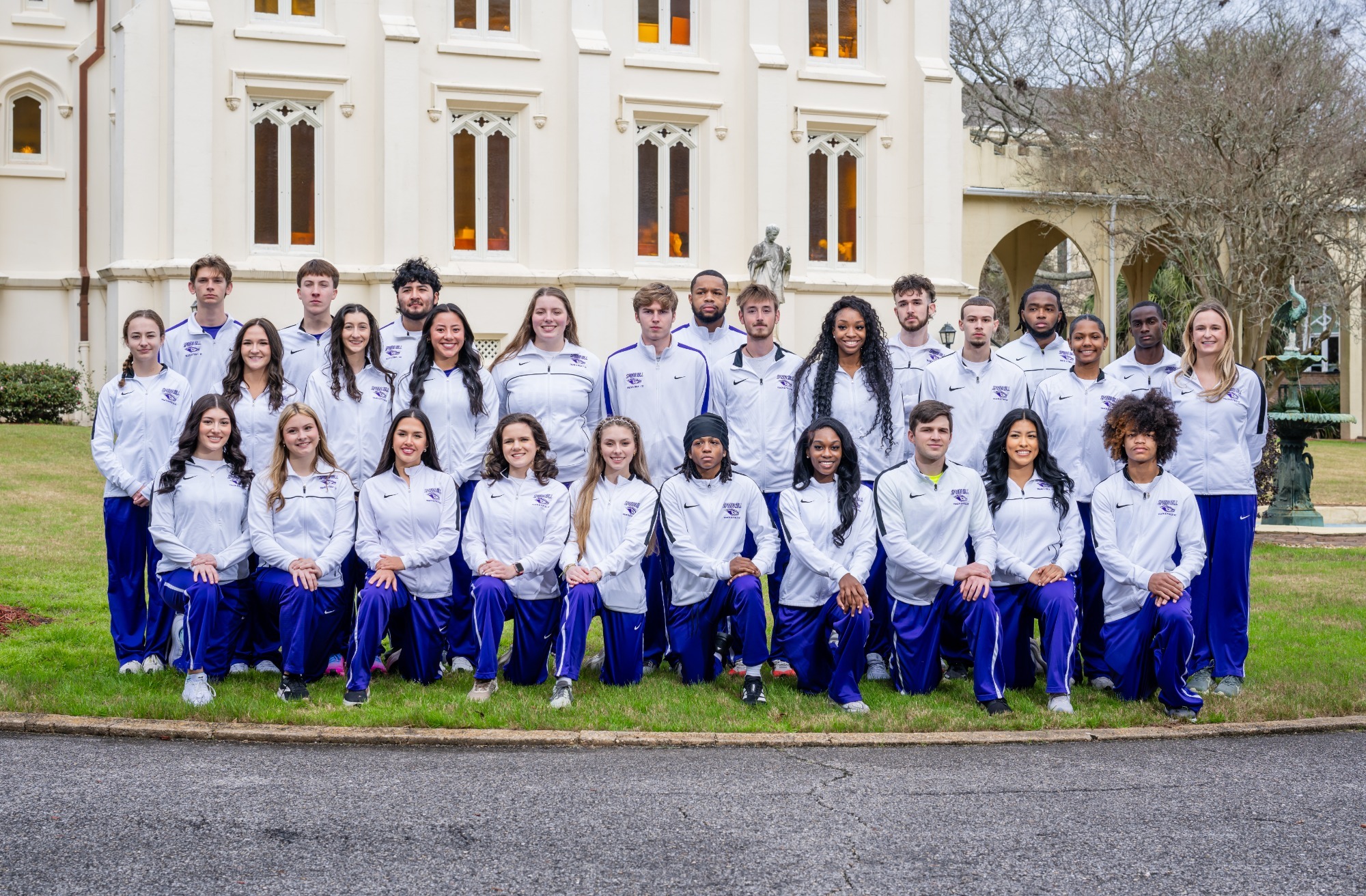 Spring Hill College men's and women's track and field student-athletes pose together during the 2025-26 media day.