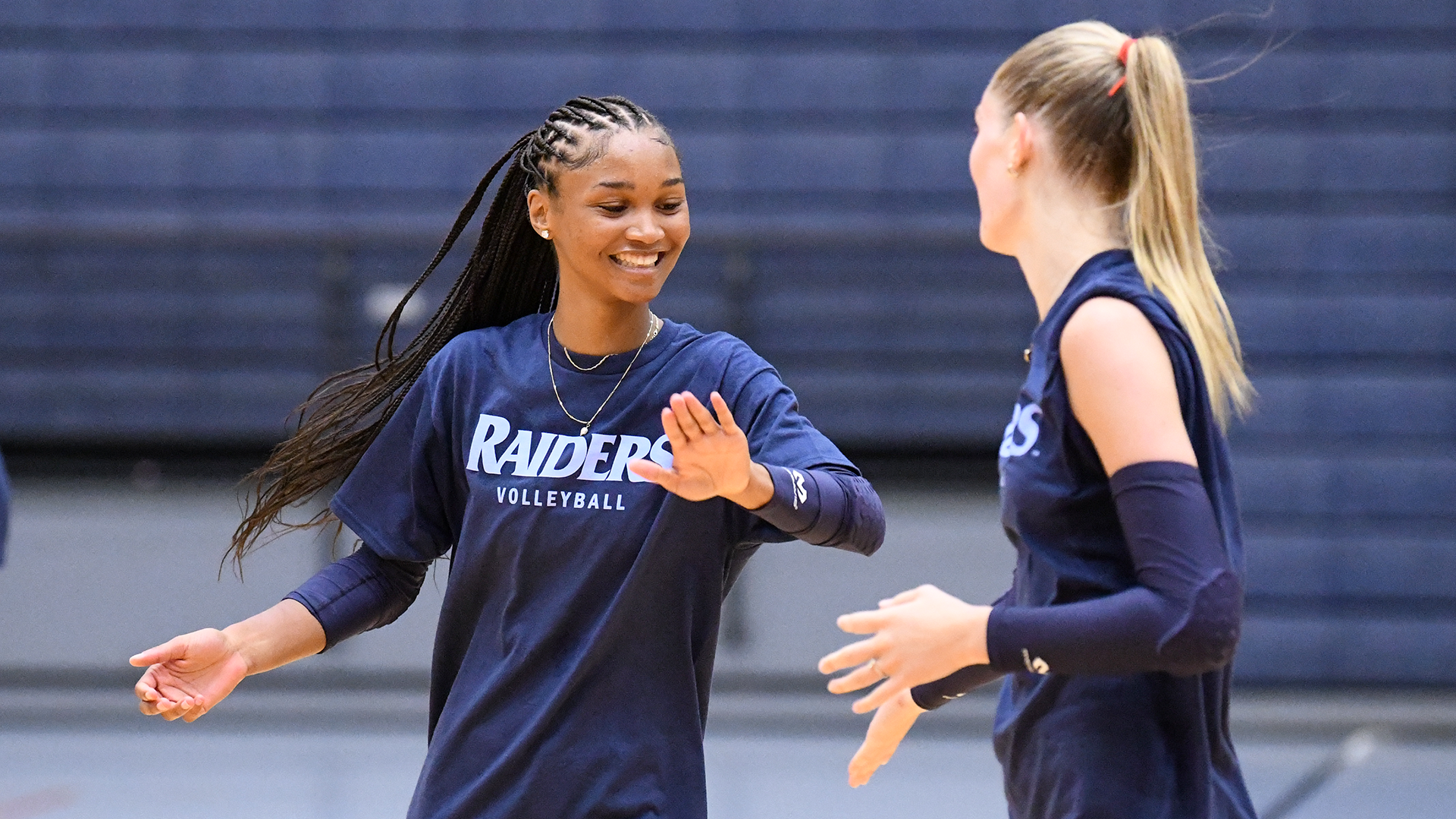 Elise Bragg celebrates at Volleyball Preseason Practice