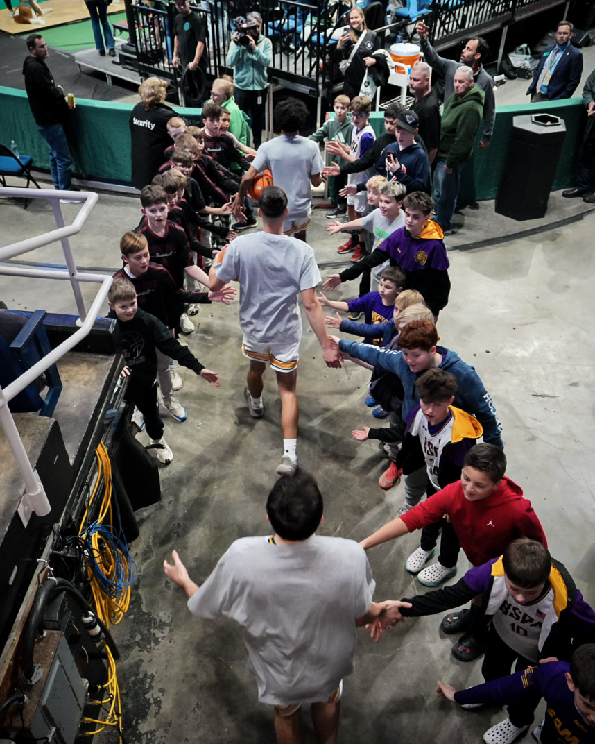 team pregame crowd fans kids