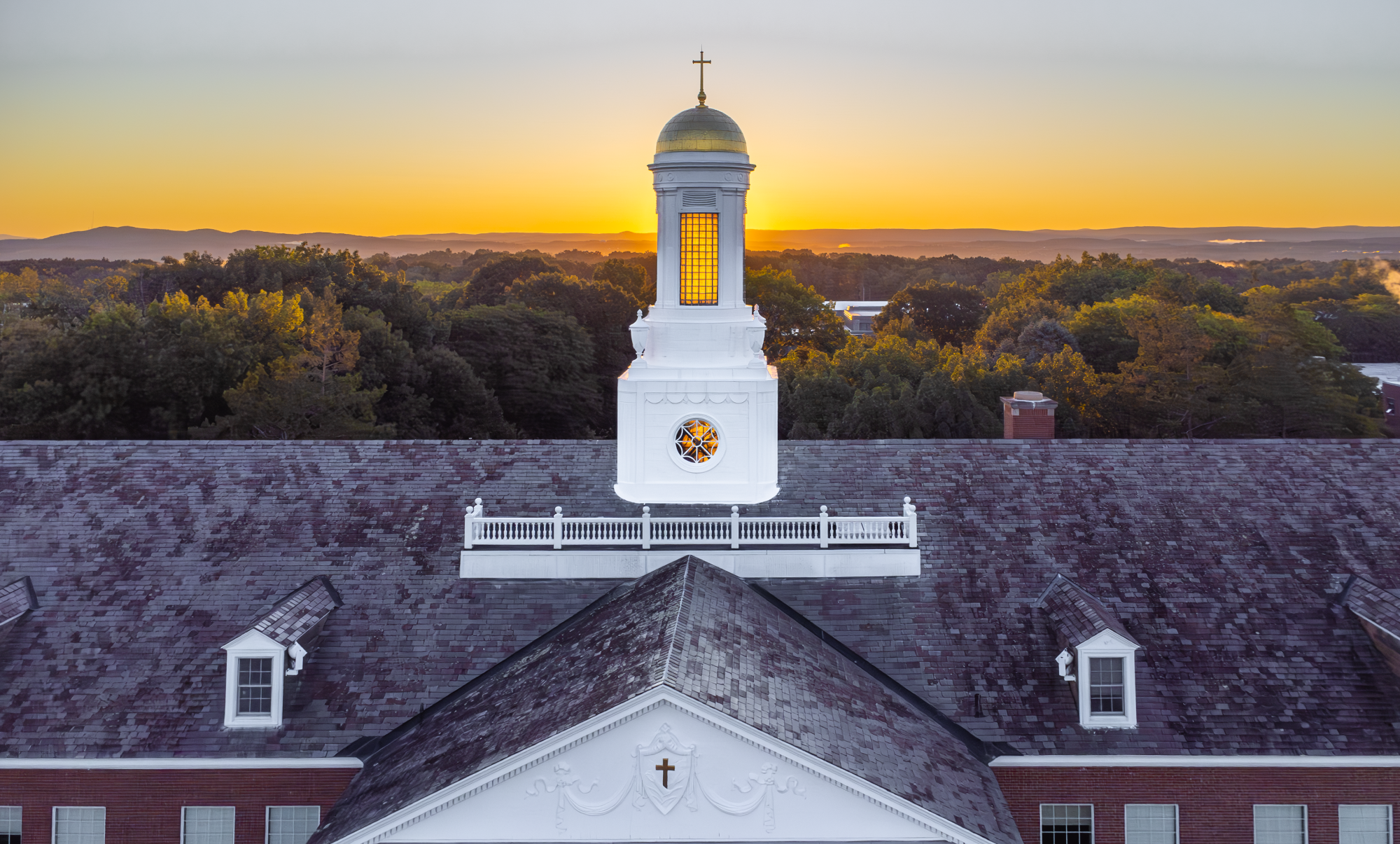 Siena Hall sunrise dome aerial campus