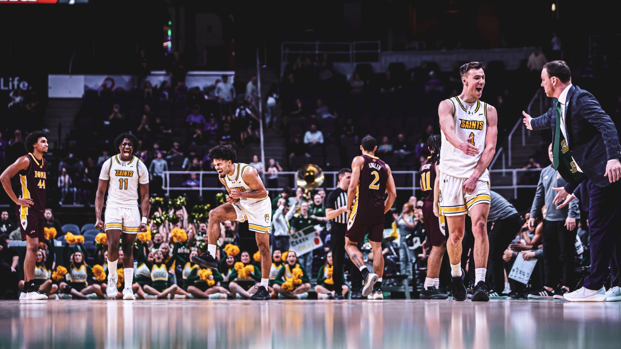 Folefac Shoats Doty Coach McNamara team celebration