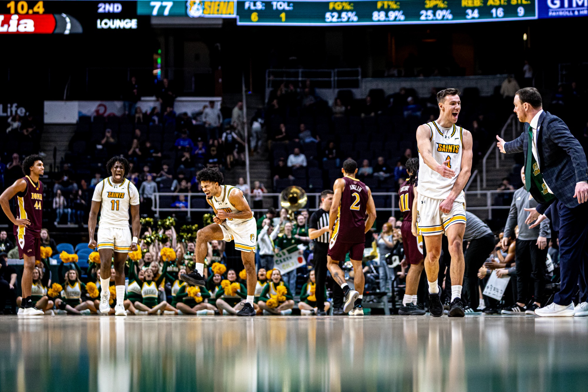 Folefac Shoats Doty Coach McNamara celebration