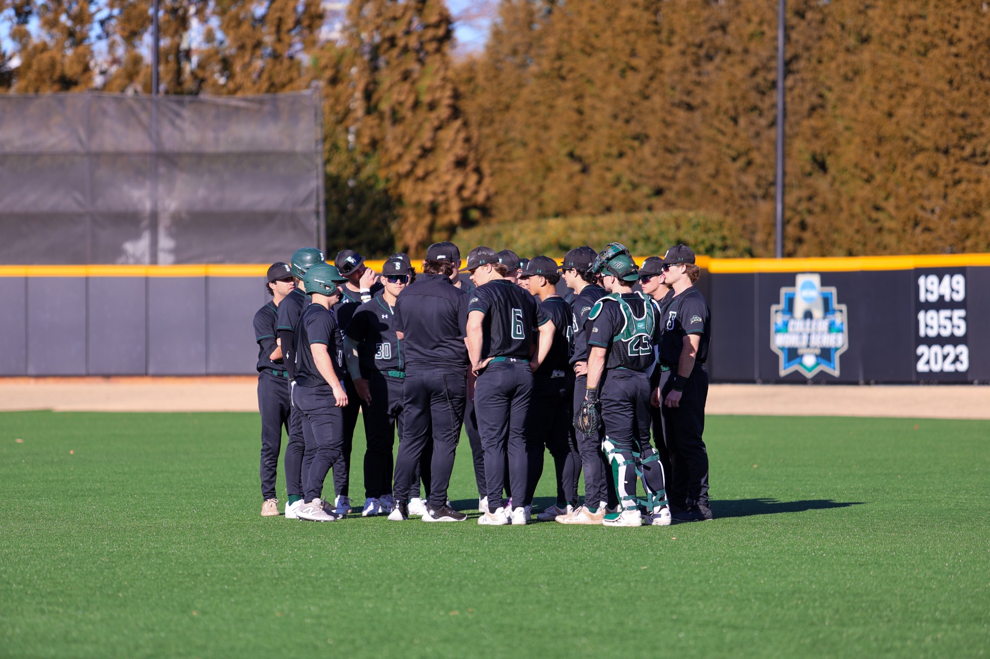 Coach Hamilton team huddle