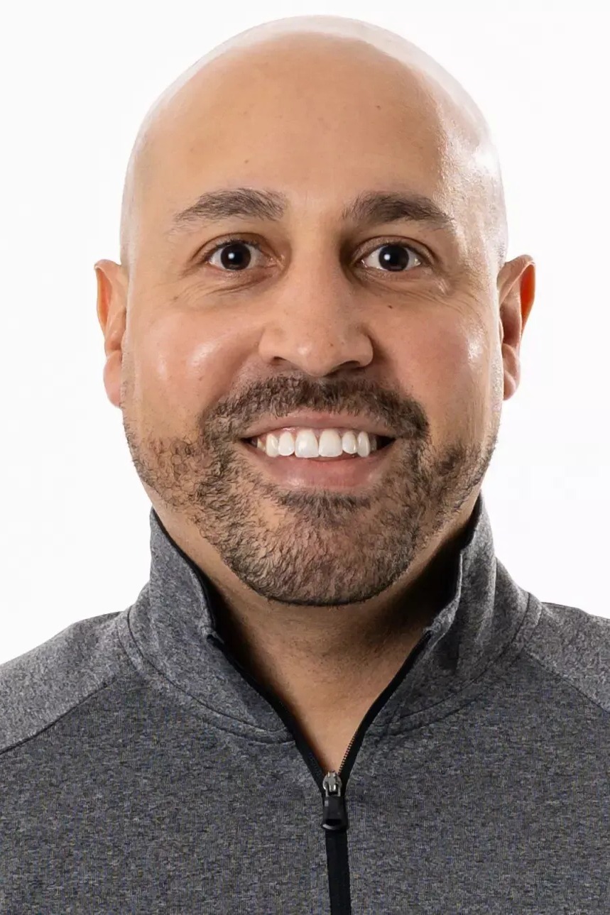 Coach Blue Loyola Headshot