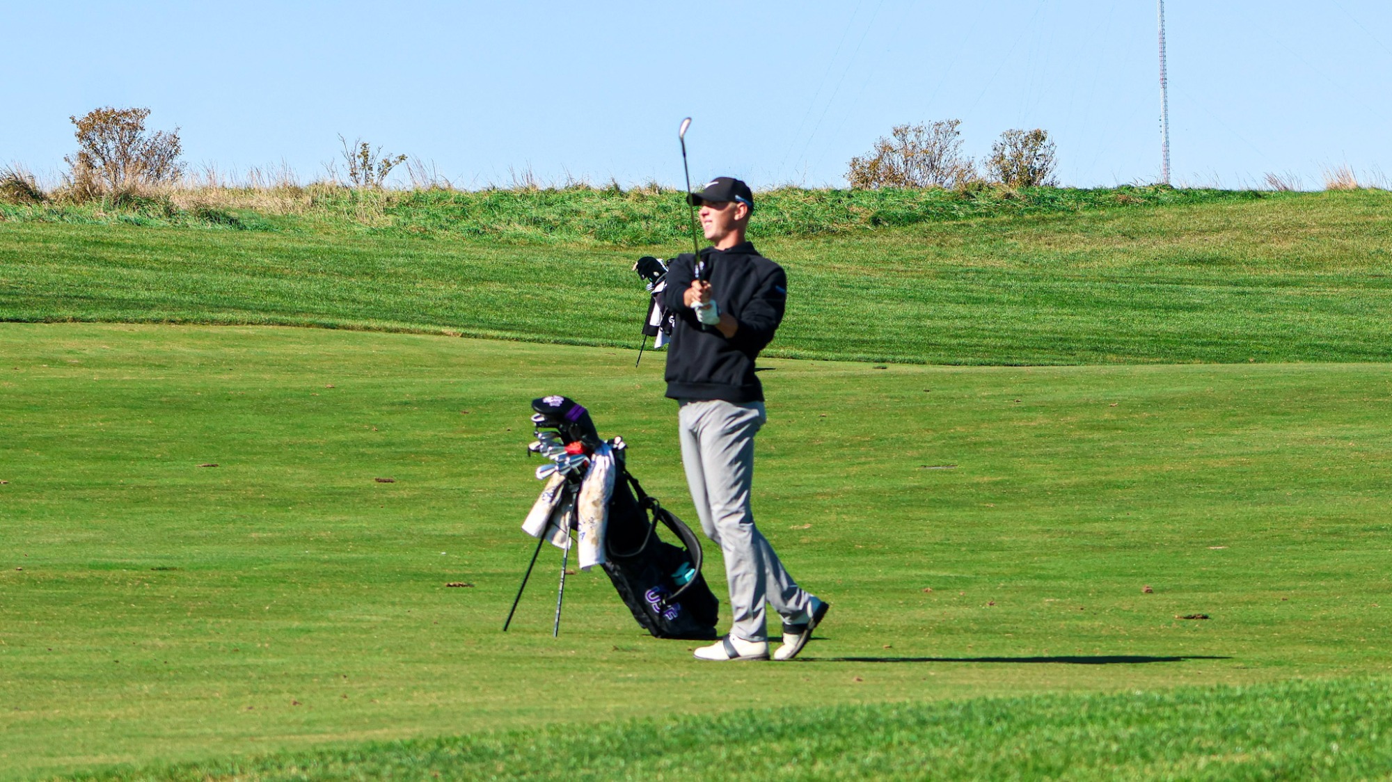 Charlie Hanson looks on after his shot