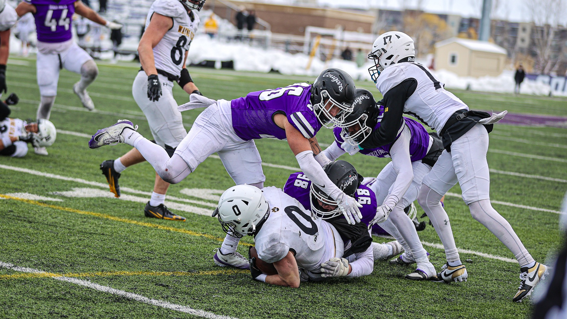 Trey Lewis and Sinn Brennan tackle Wayne State
