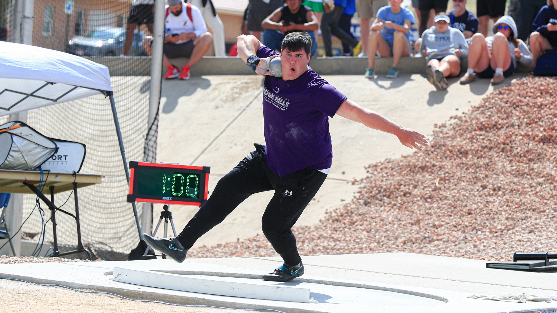 Tyler Hiatt throws shotput