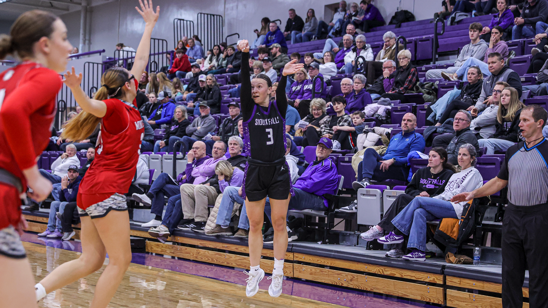 Ayla Brown shoots the three