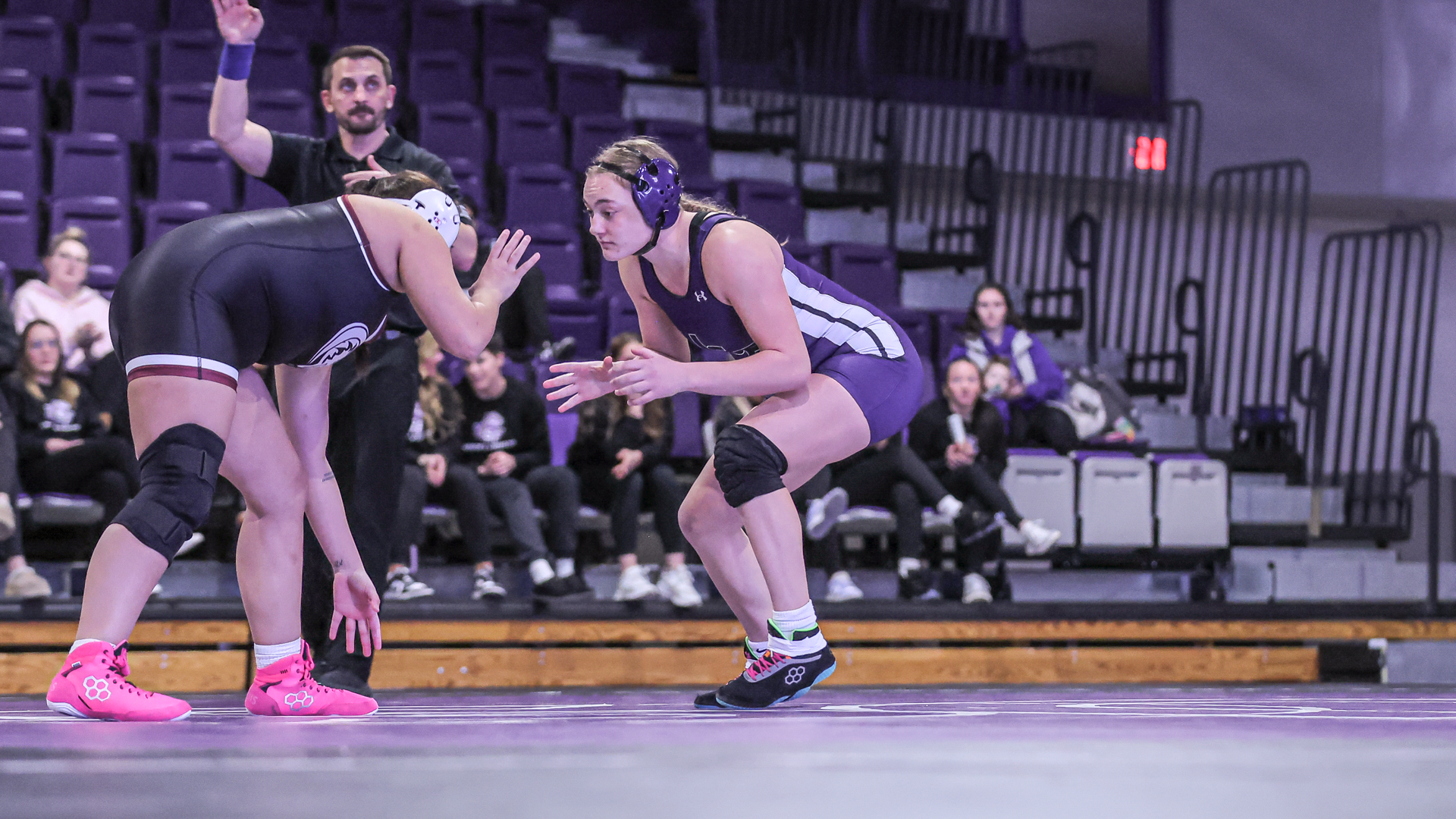 Rachel Berger wrestles Chadron State opponent