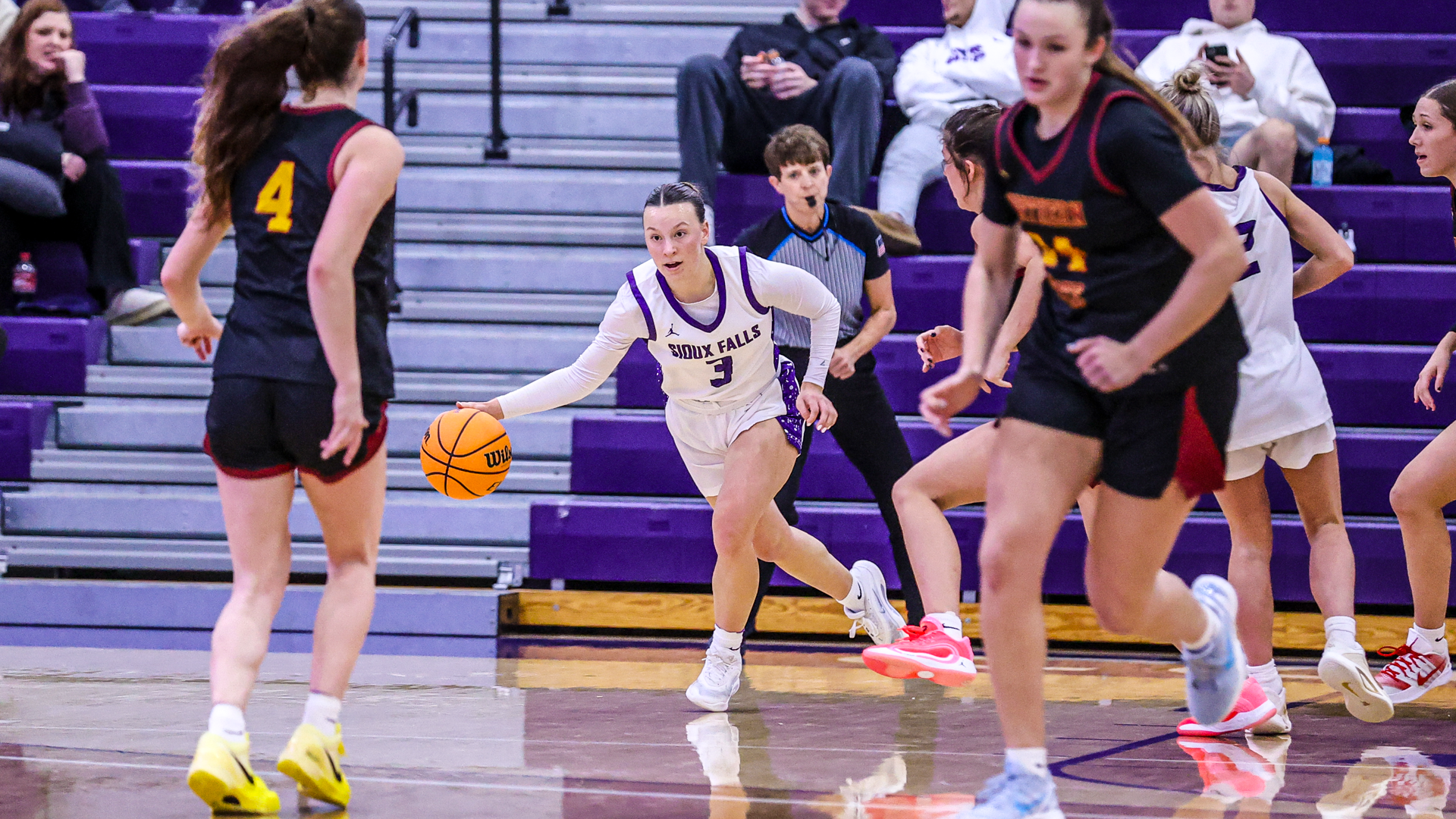 Ayla Brown brings up the ball
