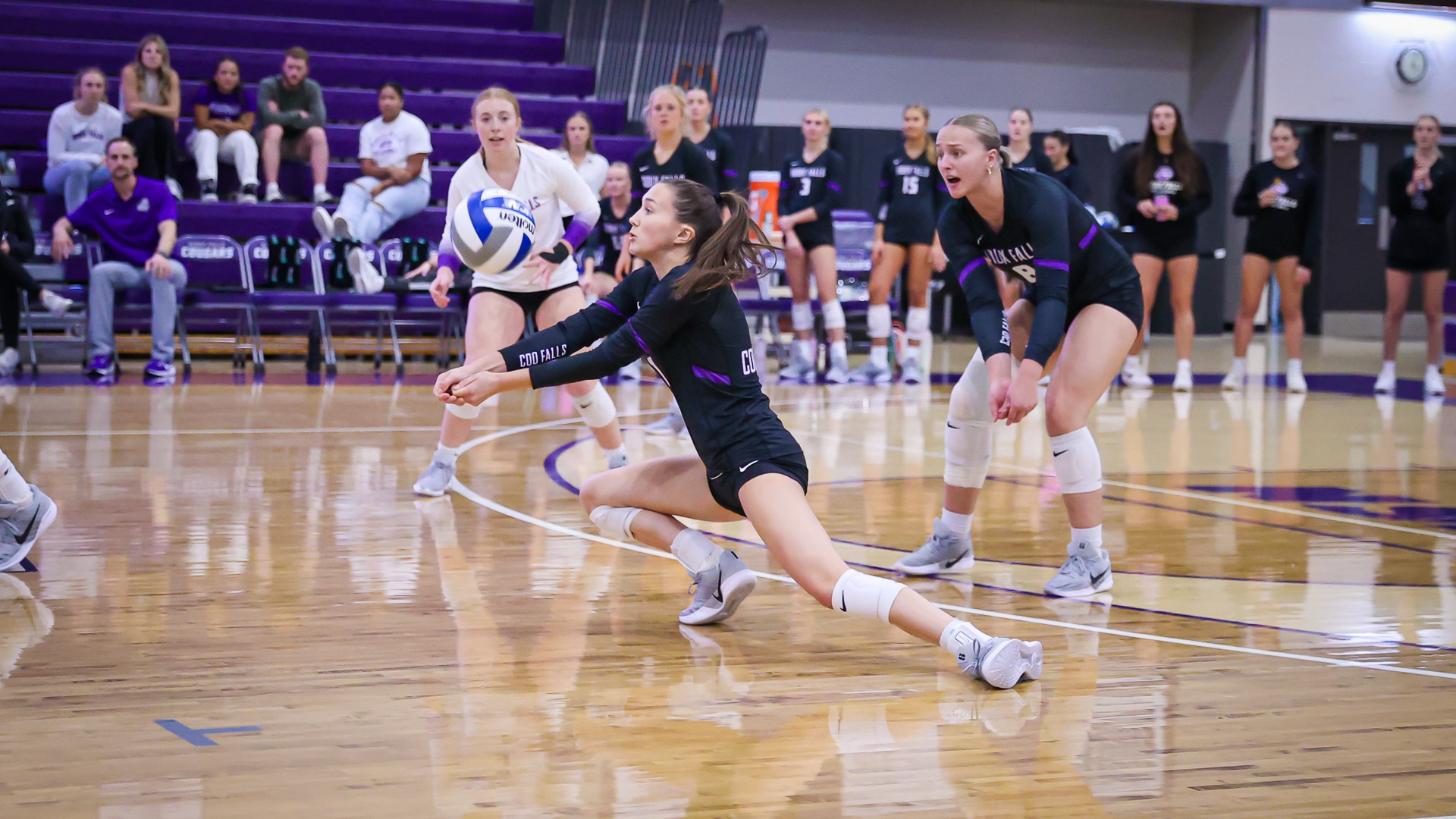Kyleigh Tangen digs a ball against Jamestown