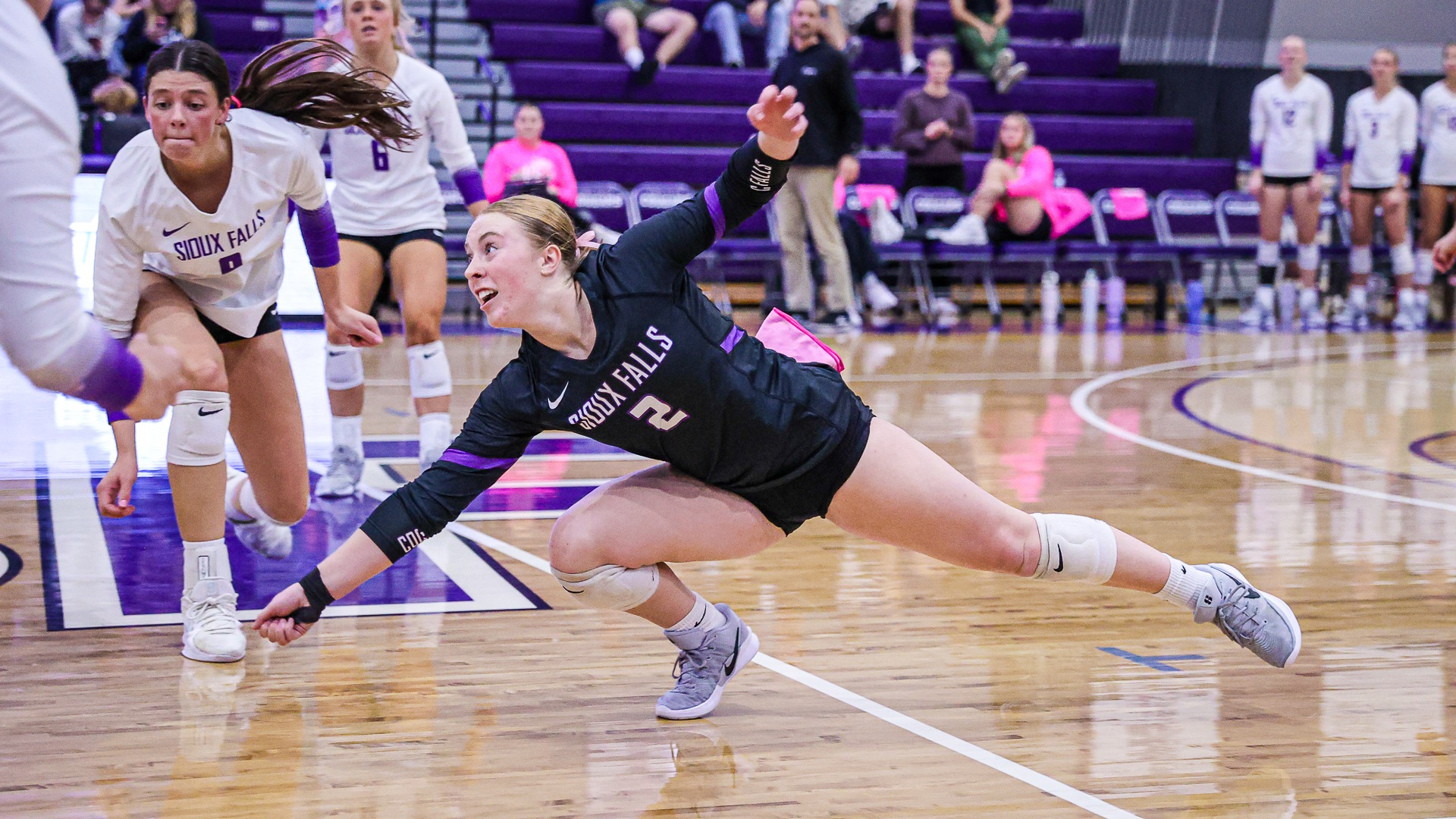 Maci Lerseth digs a ball against MSU Moohead