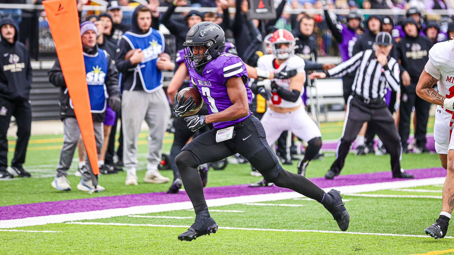 Bubba Tann II runs in a touchdown against Minot State