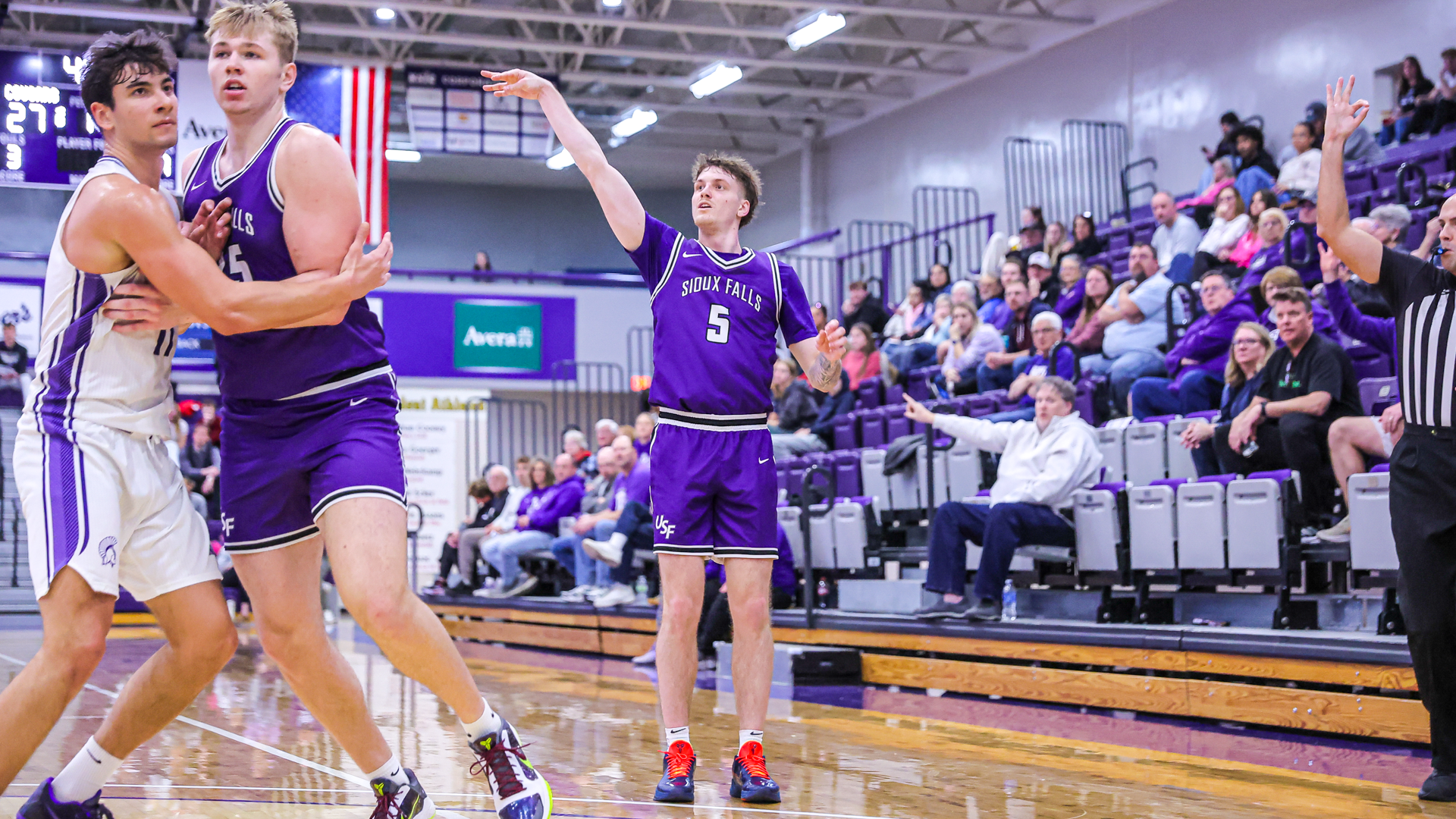 Lewis Woosnam takes a three