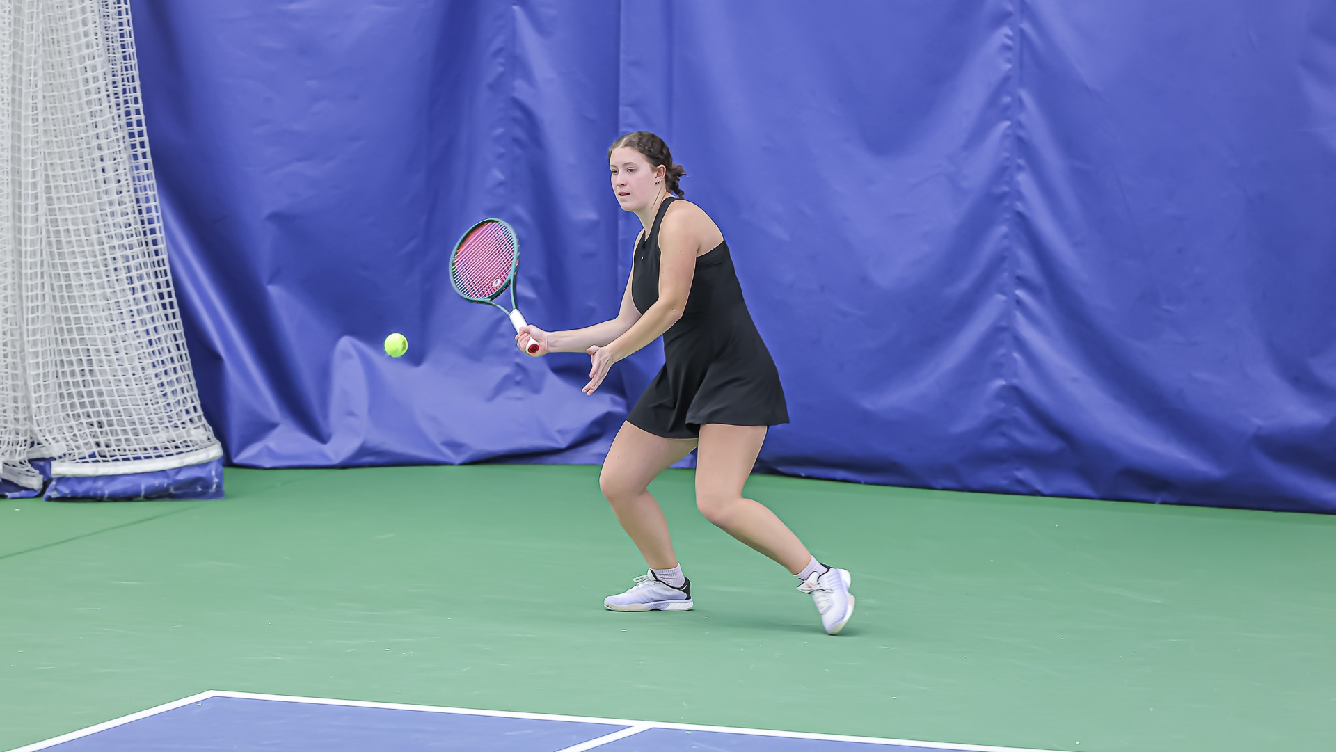Ella Hancock Serving a Ball