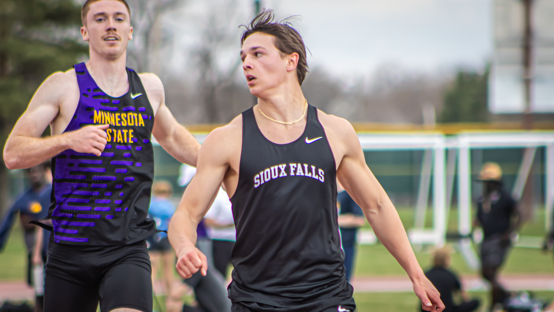 Micah Holien sprints through the line