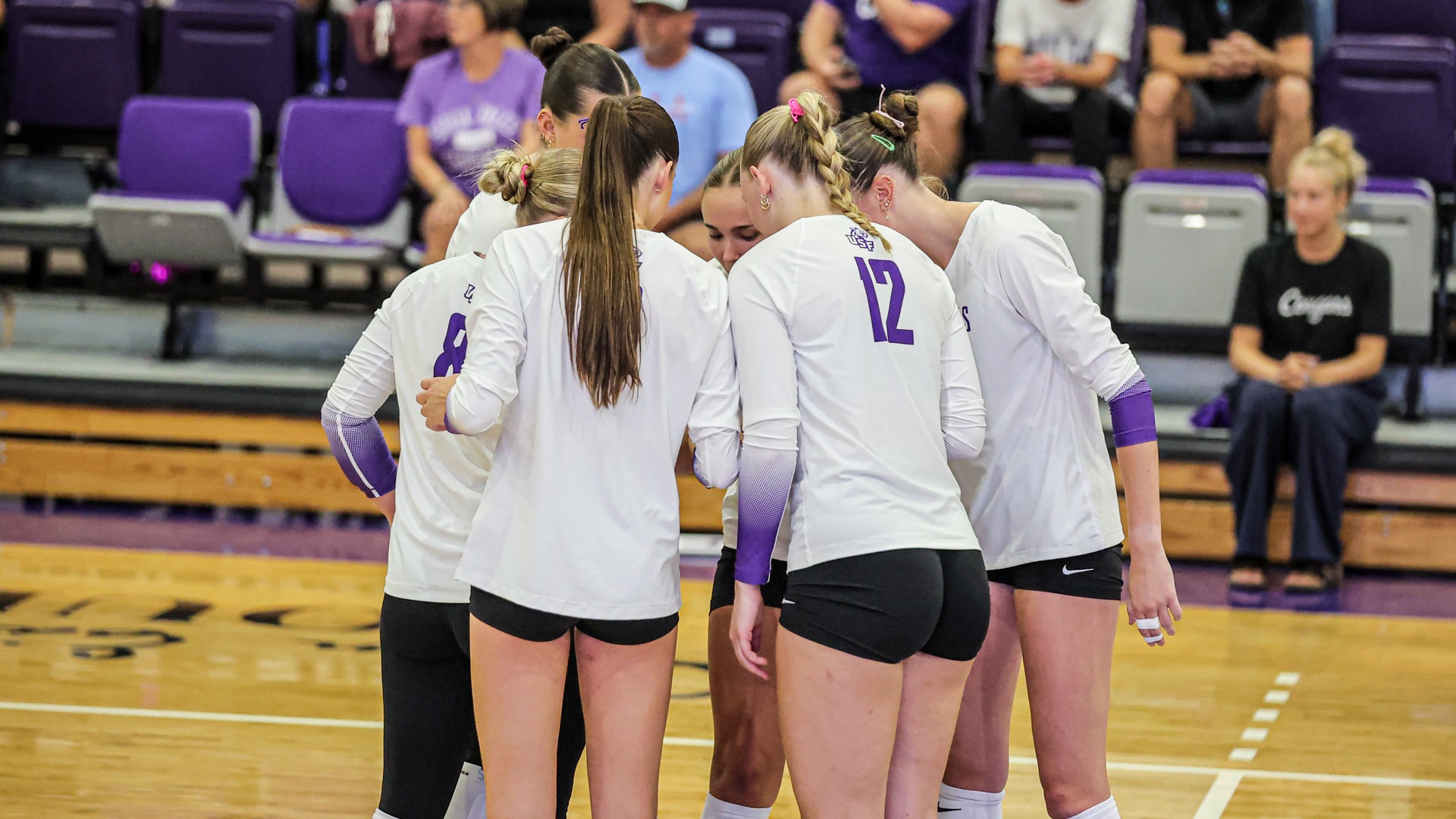 USF Volleyball huddles following a point against Emporia State