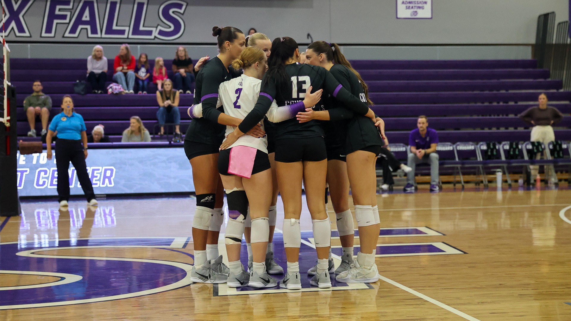 USF Volleyball huddle prior to match against St. Cloud State