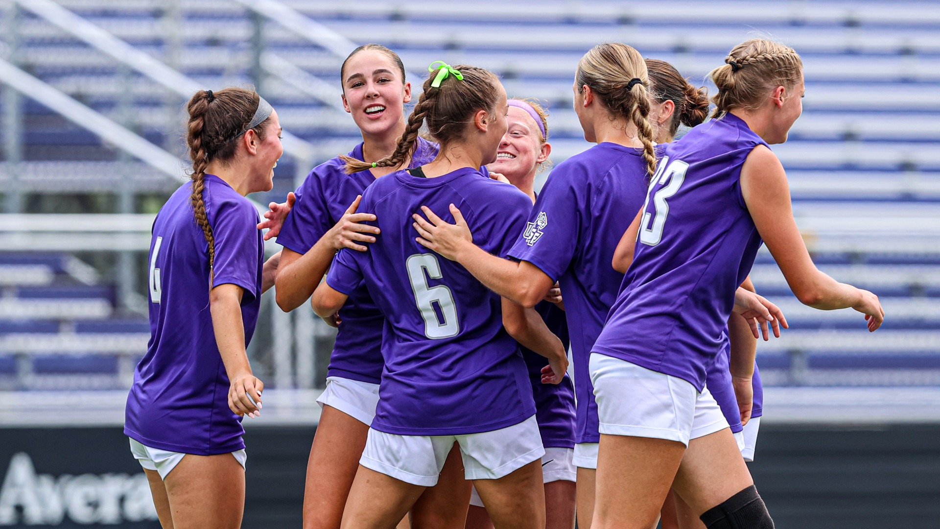 USF Soccer team celebrates following goal by Kate Stratman