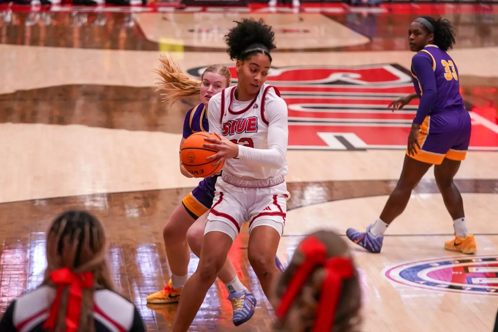 Syanne Mohamed boxing out against TTU