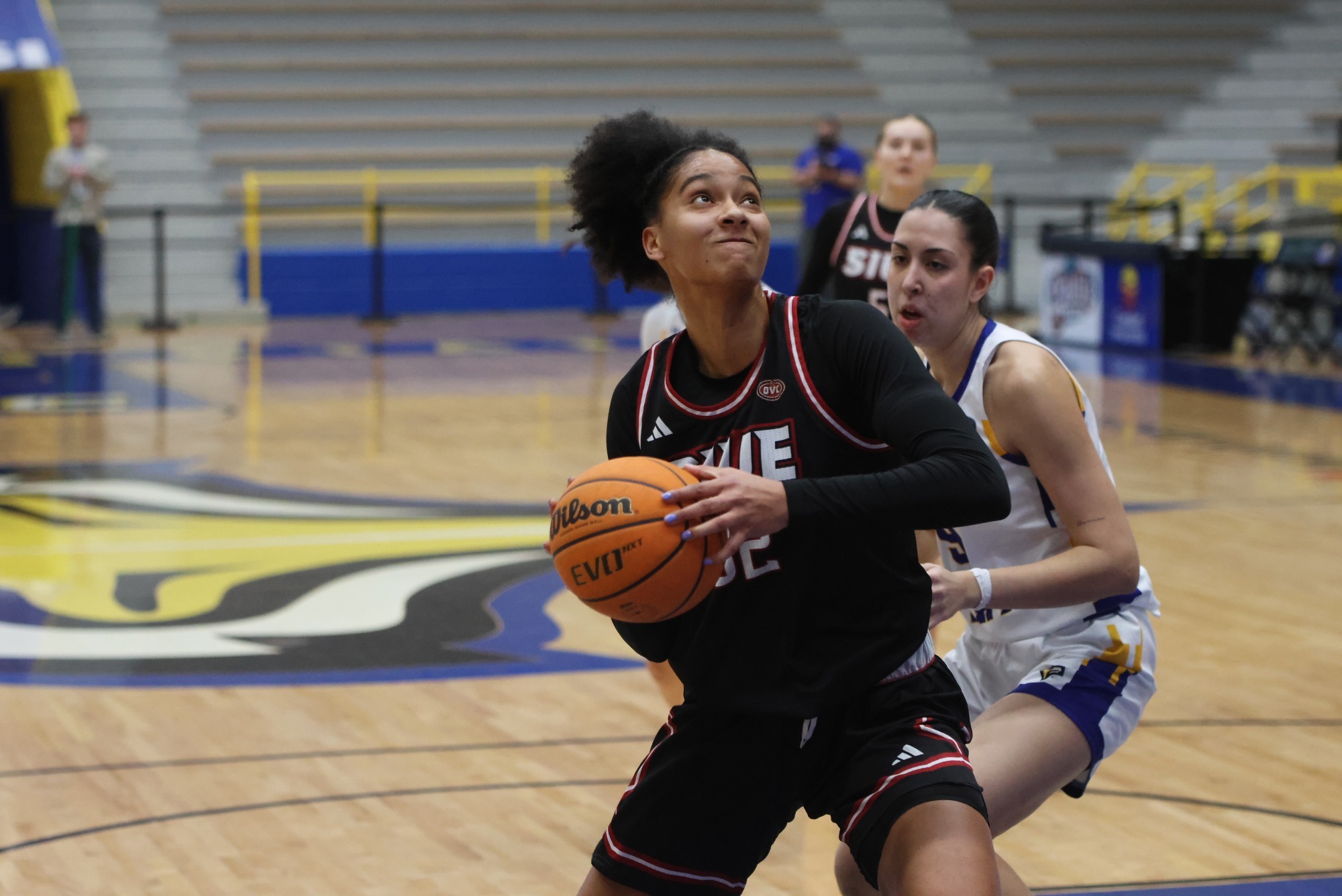 Syanne Mohamed going for a layup