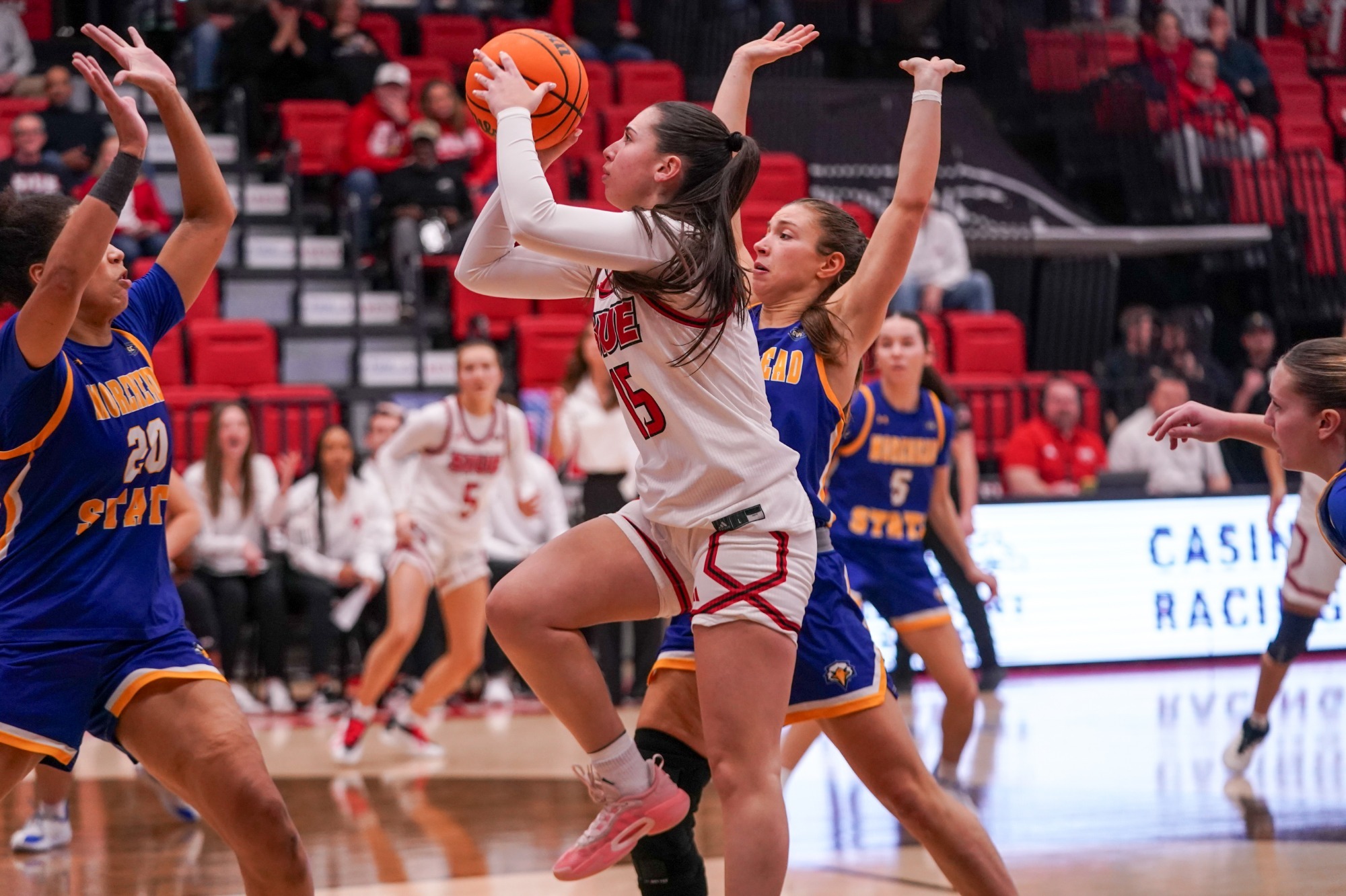 Adriana Blazquez driving to the hoop
