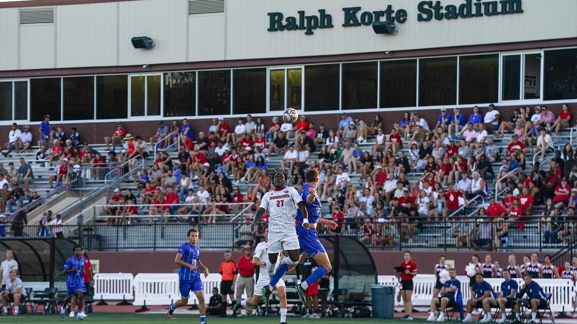 Amos Boum Nlend leaps for a header against Saint Louis