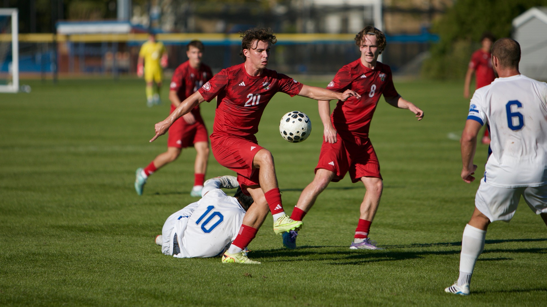 Mathias Clausen works with Daniel Murray against Eastern Illinois