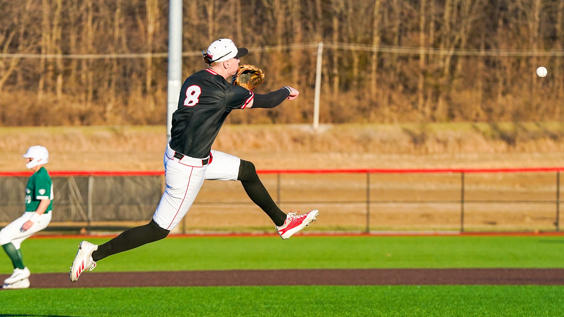 Ethan Willoughby throws from third base