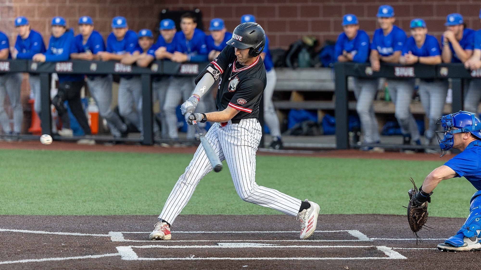 Ryan Niedzwiedz swings against Saint Louis