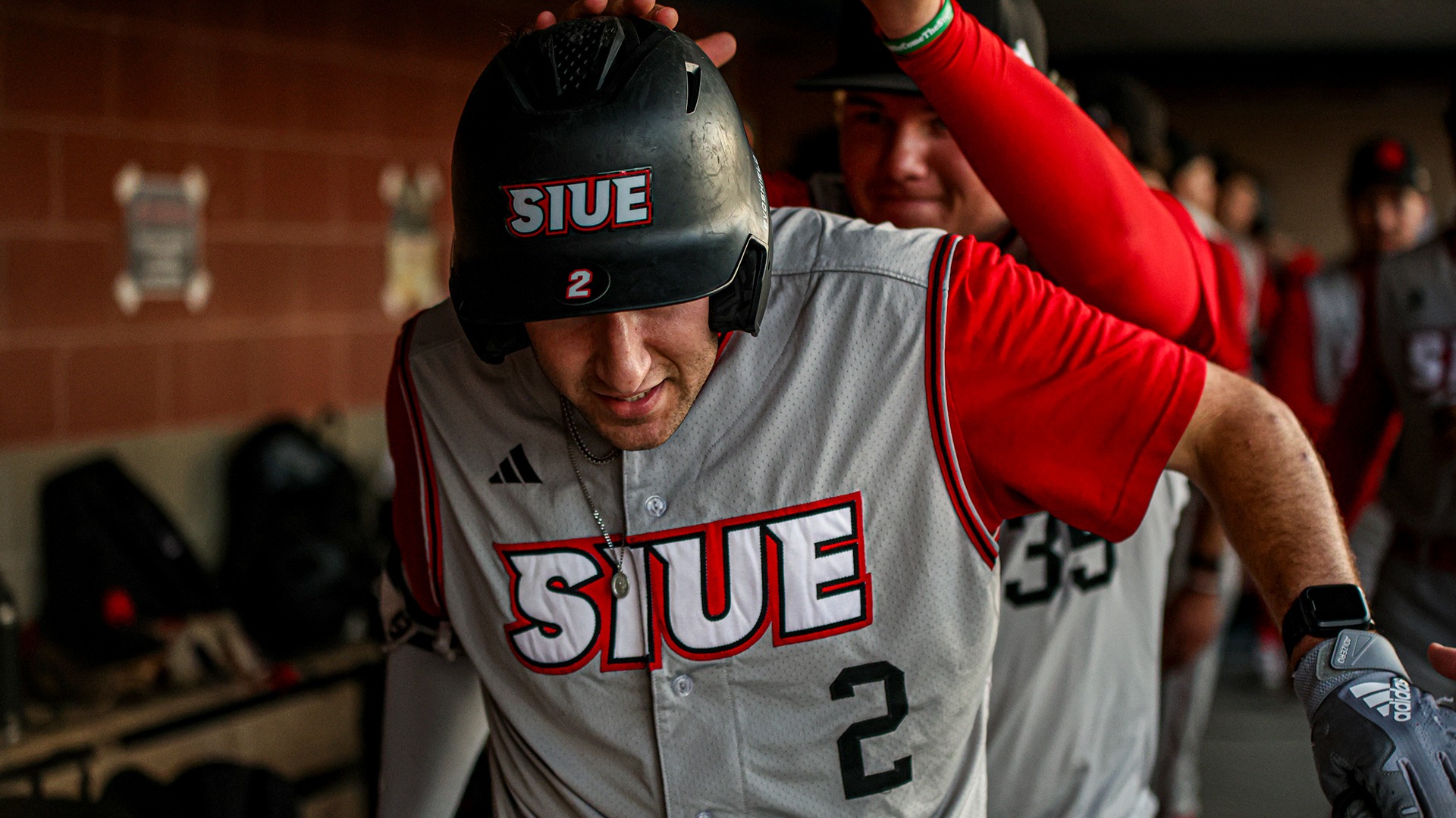 Ryan Niedzwiedz celebrates in the dugout at Indiana State
